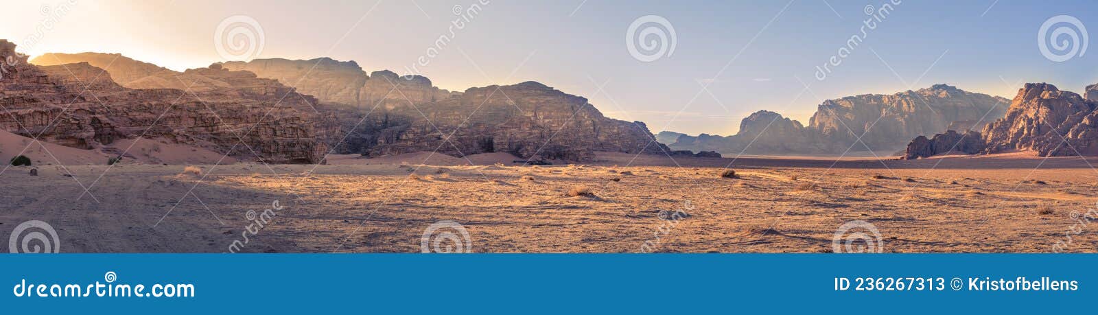 panorama landscape shot of wadi rum desert in jordan during golden hour