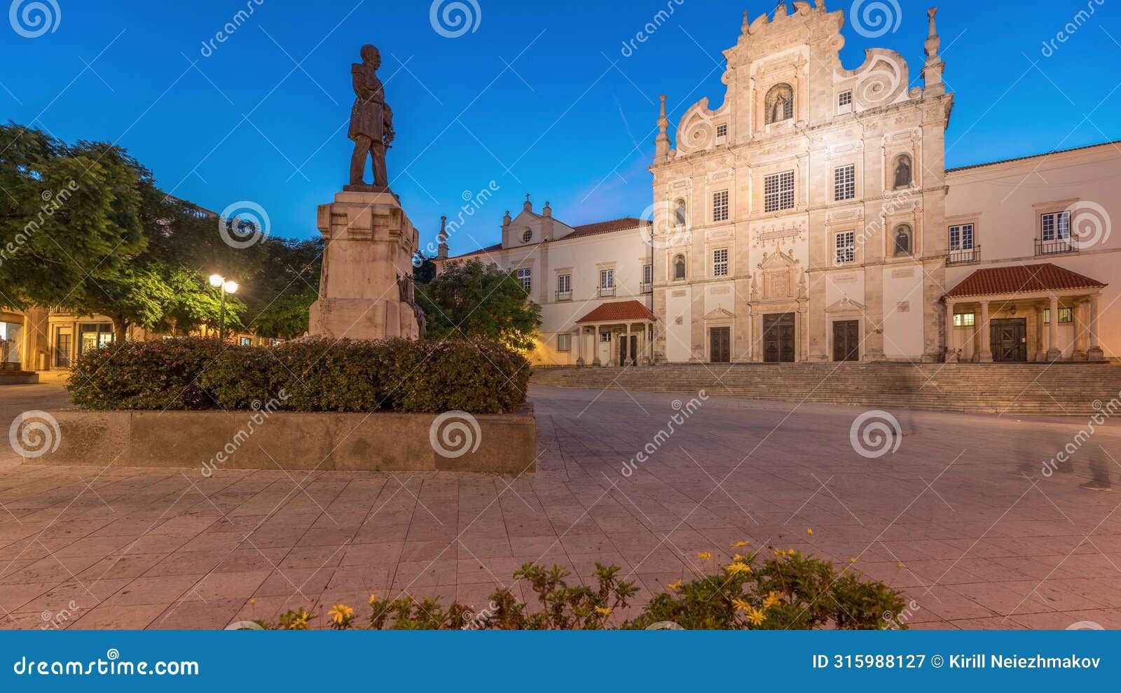 panorama showing sa da bandeira square with a view of the santarem see cathedral day to night timelapse. portugal