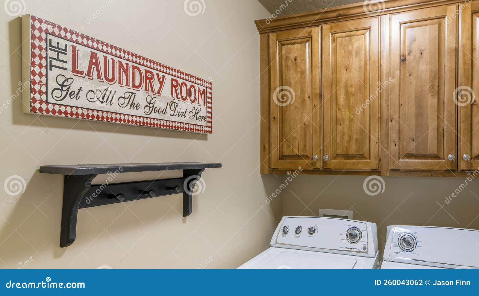 Panorama Small Laundry Room Interior with Shelf and Decorative Statement Signboard on the Wall