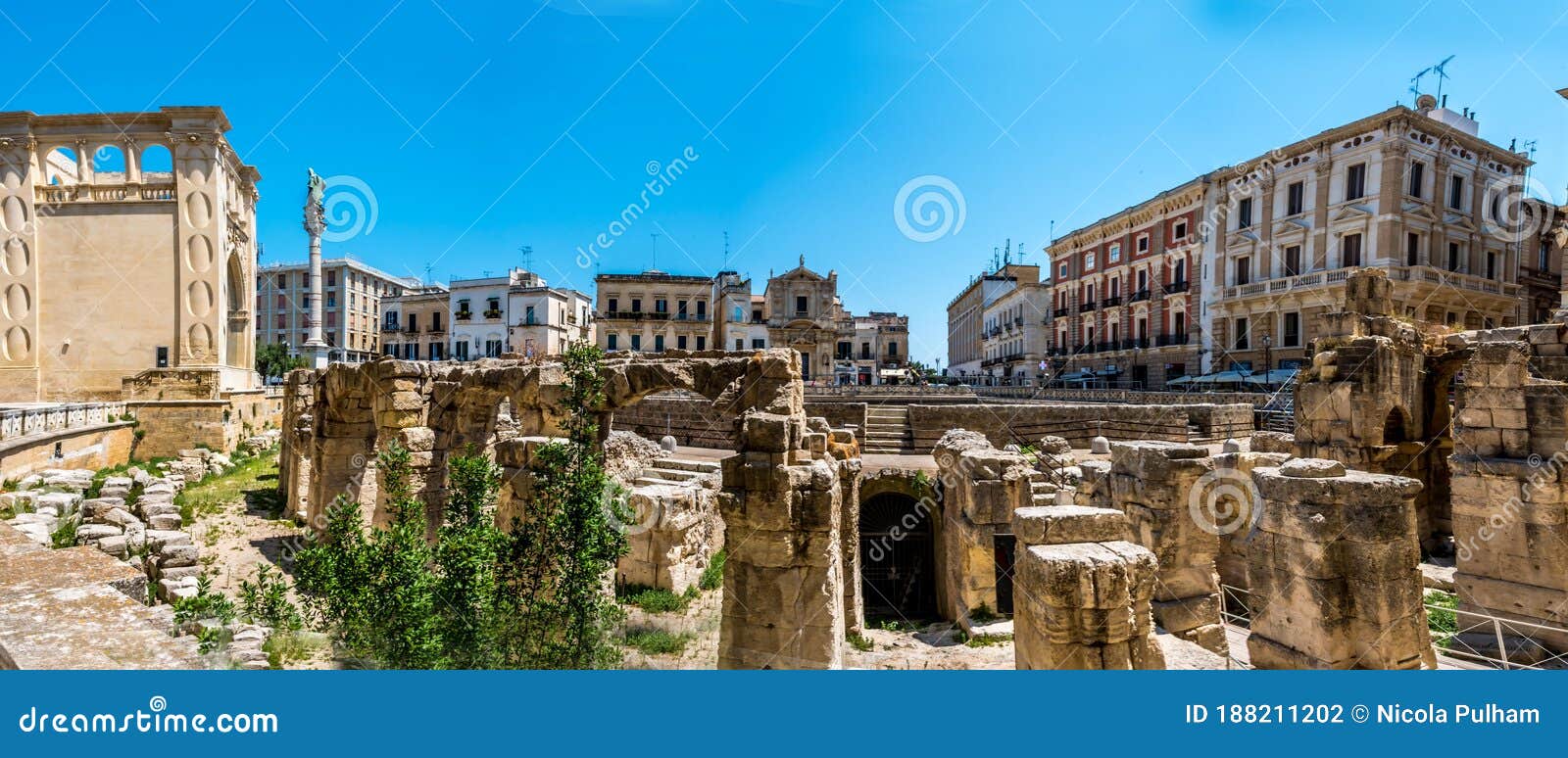 a panorama view across the cathedral square and the bell tower in leece, italy