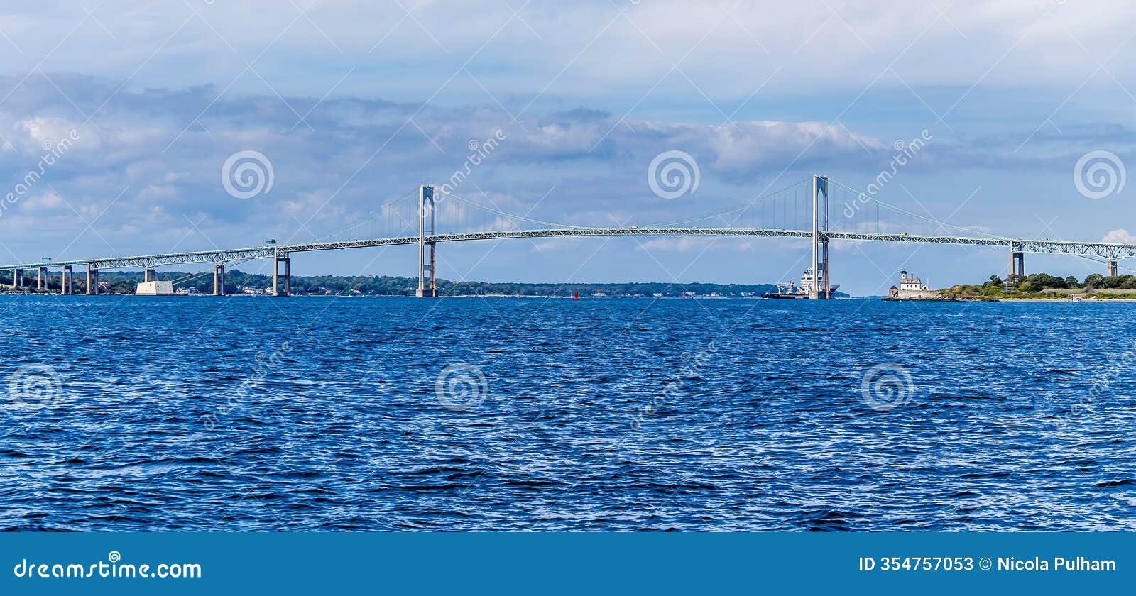 a panorama view across narragansett bay towards the newport bridge at newport, usa