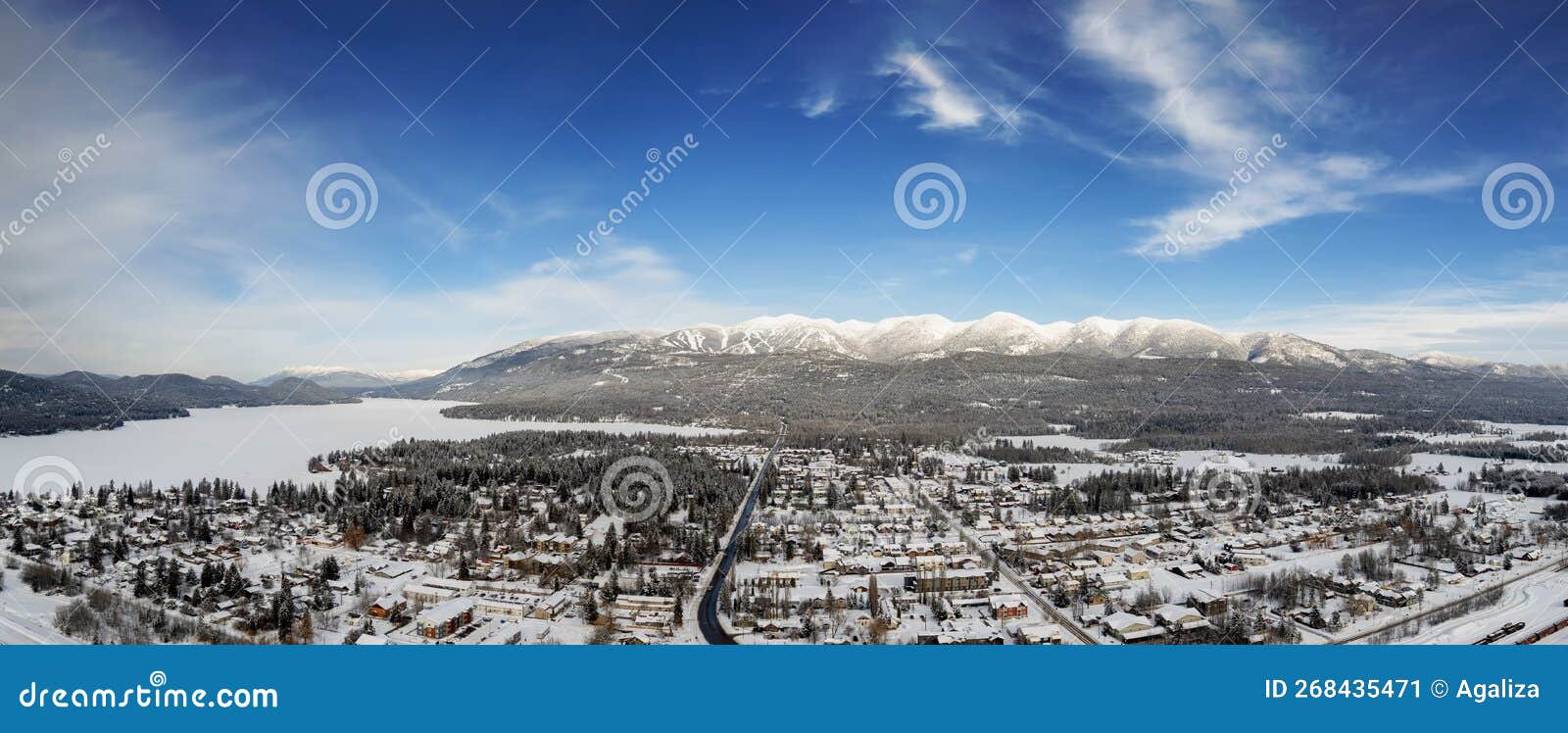 panorama of whitefish, montana and lake towards the rocky mountains