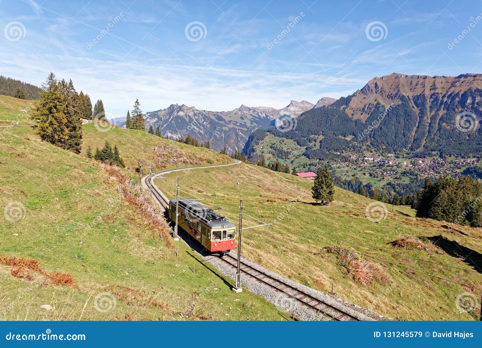 panoramatic view of jungfrau region with incoming train from gruetschalp grÃÂ¼tschalp near winteregg