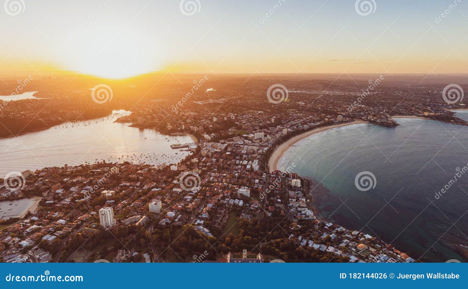 panoramic aerial drone sunset view of manly, an affluent seaside suburb of sydney, new south wales, australia.