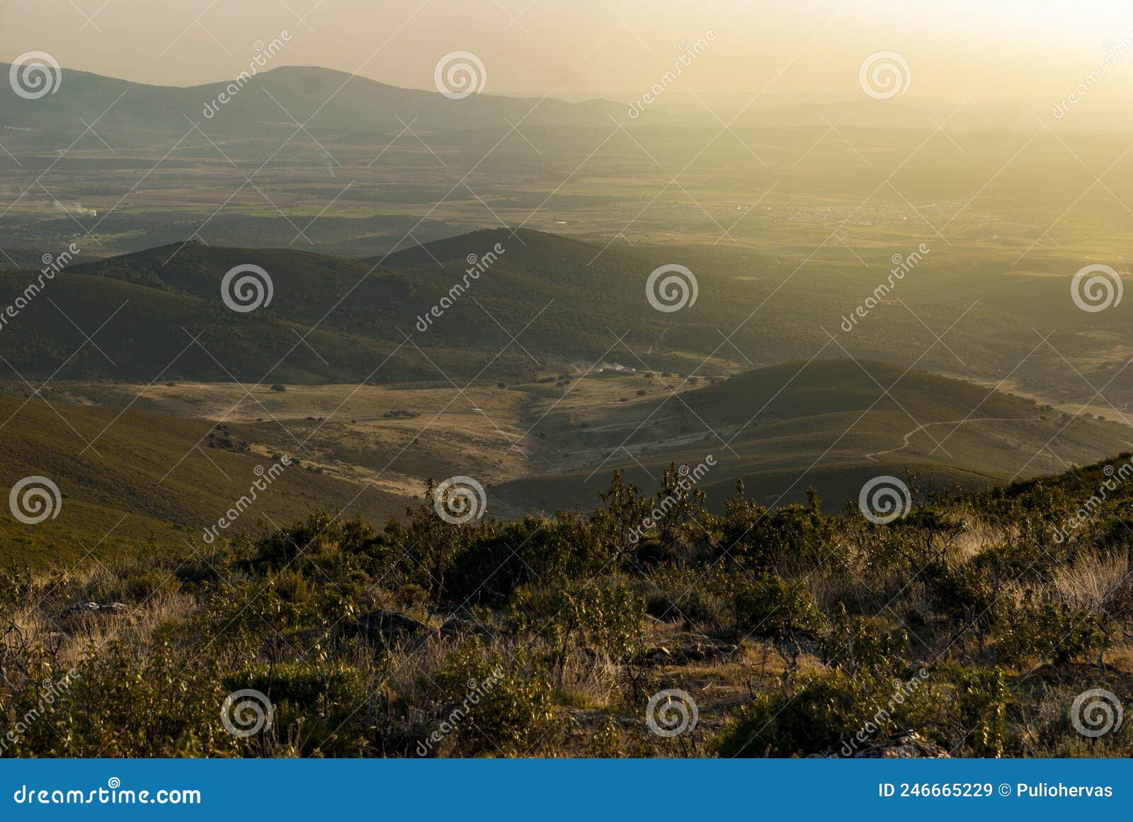 panoramic aerial view of tierras de granadilla and montes de abadia at sunset