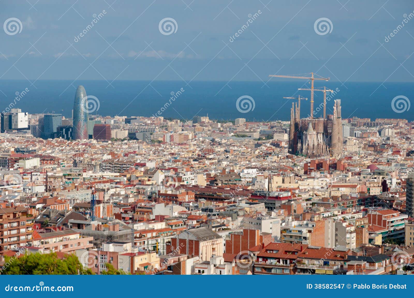 panoramic of barcelona sagrada familia and agbar