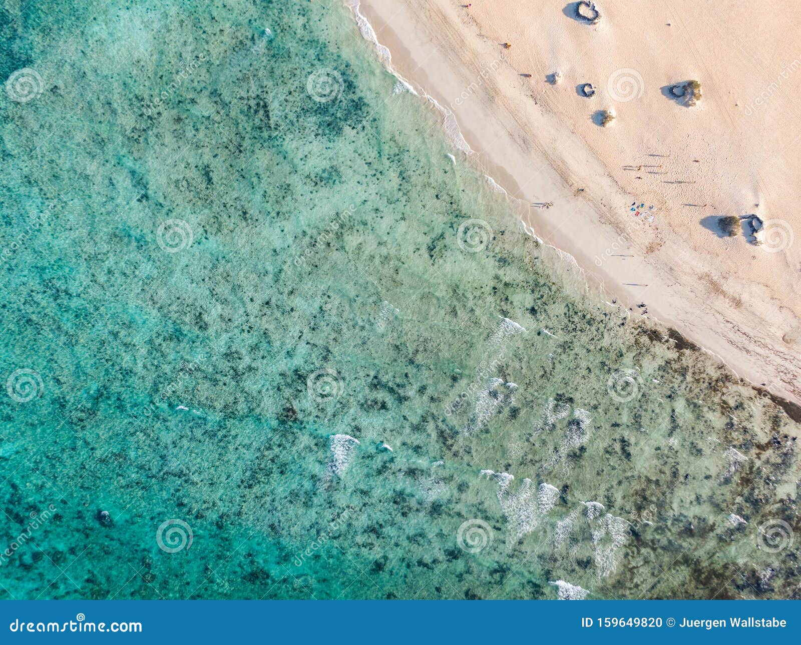 panoramic bird`s eye aerial drone view of a beach section at corralejo national park parque natural de corralejo