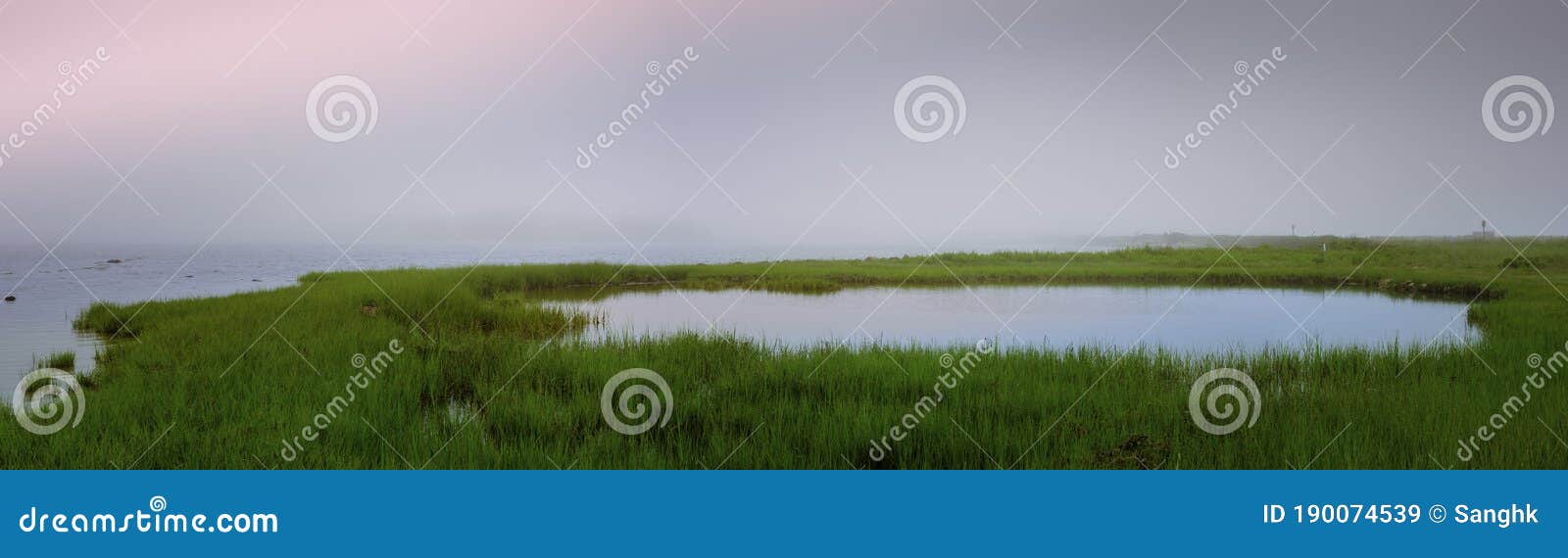 panoramic foggy landscape over israels cove at menauhant beach on cape cod