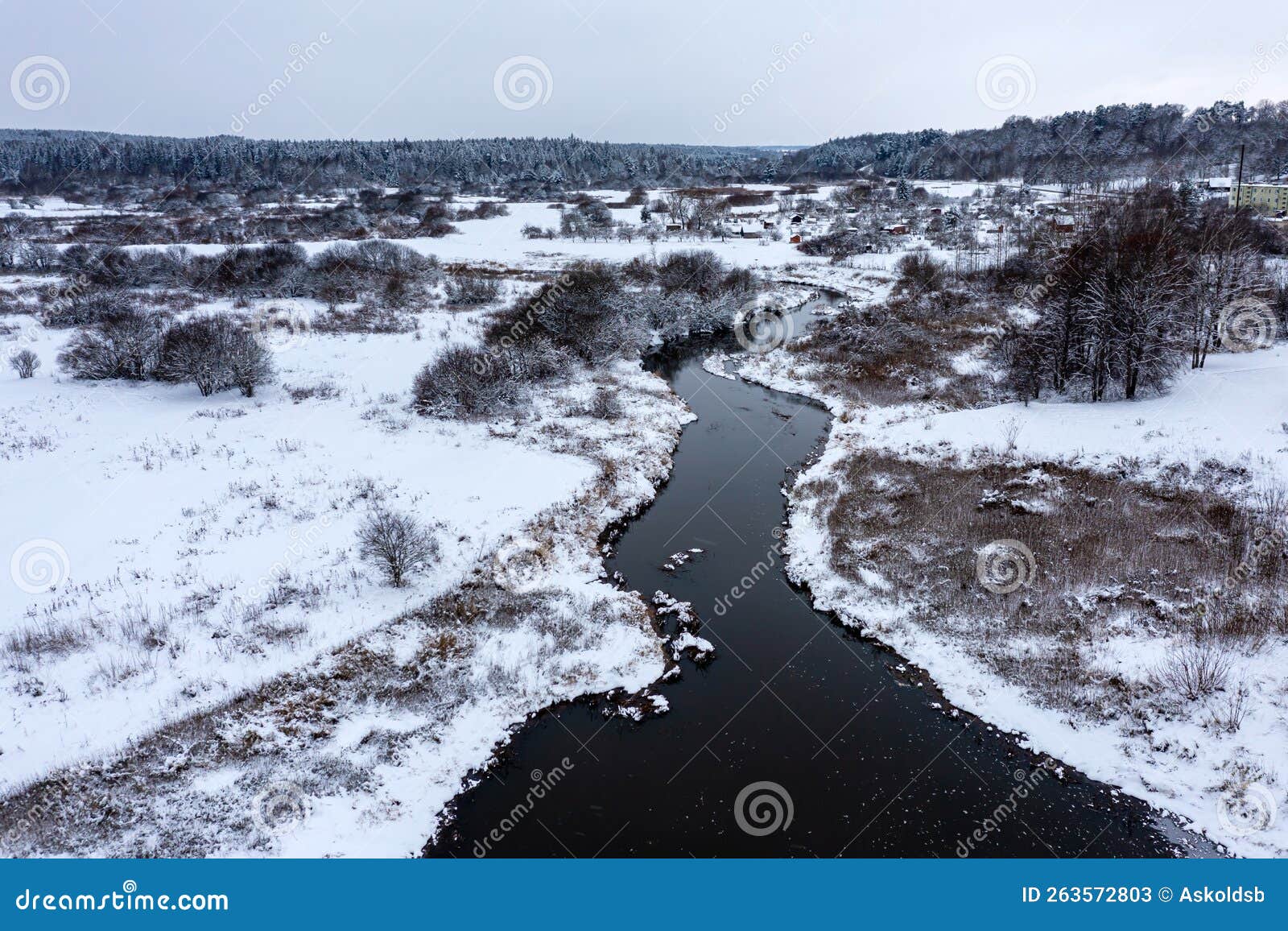 panoramic latvian winter landscape with abava river flowing through the plain near kandava