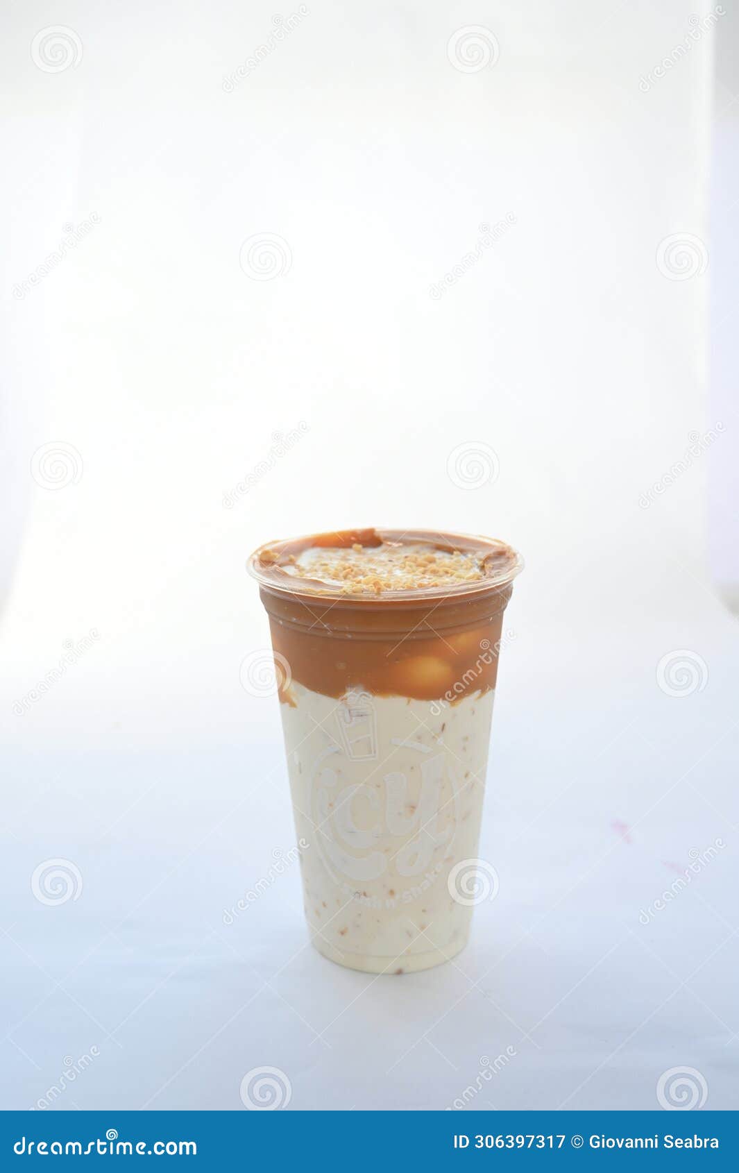 panoramic still life of colorful frozen fruit granita drinks flowing in plastic takeaway cups with ice cream straws