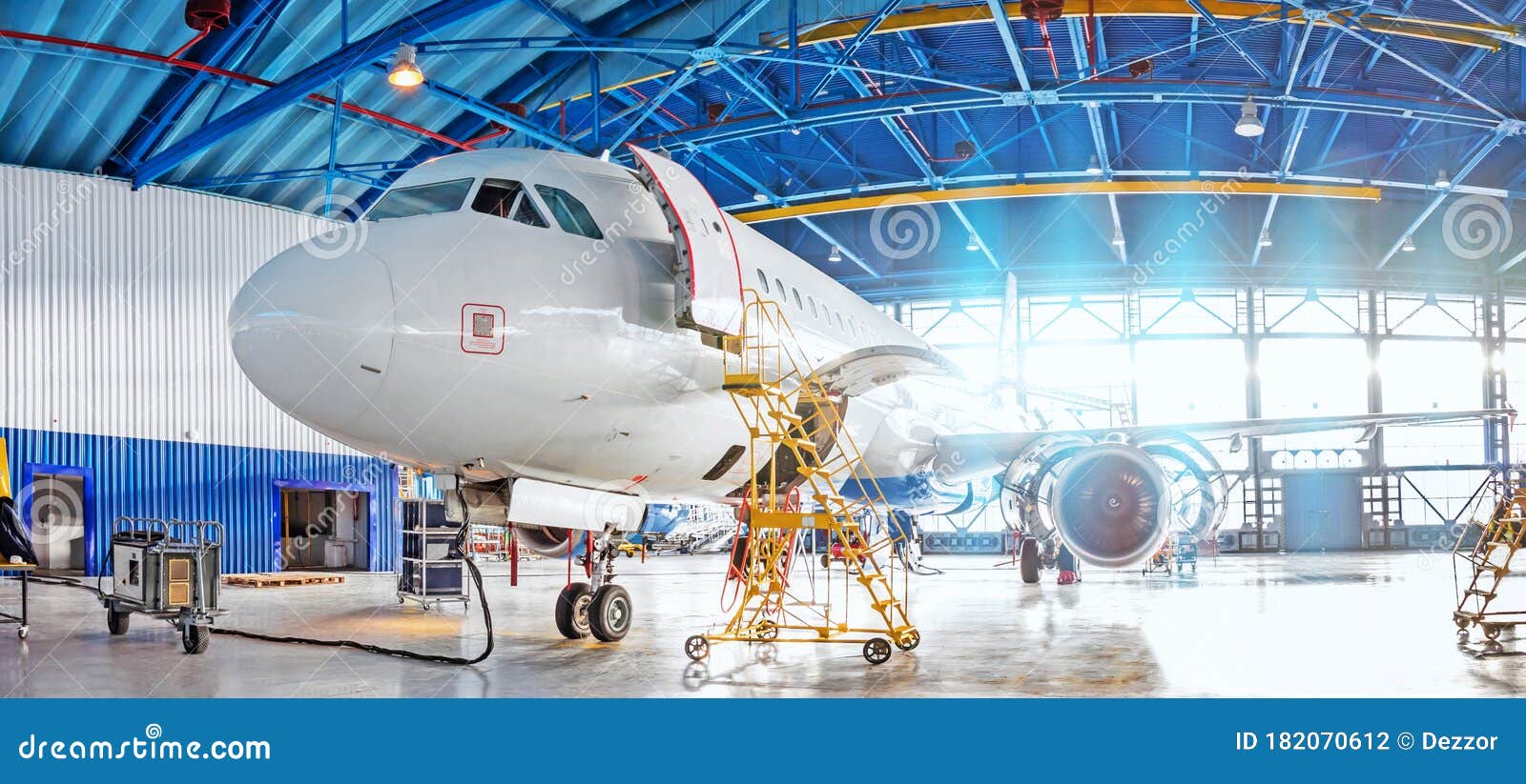 panoramic view of aerospace hangar, civil aviation aircraft, repair and maintenance of mechanical parts in an industrial workshop