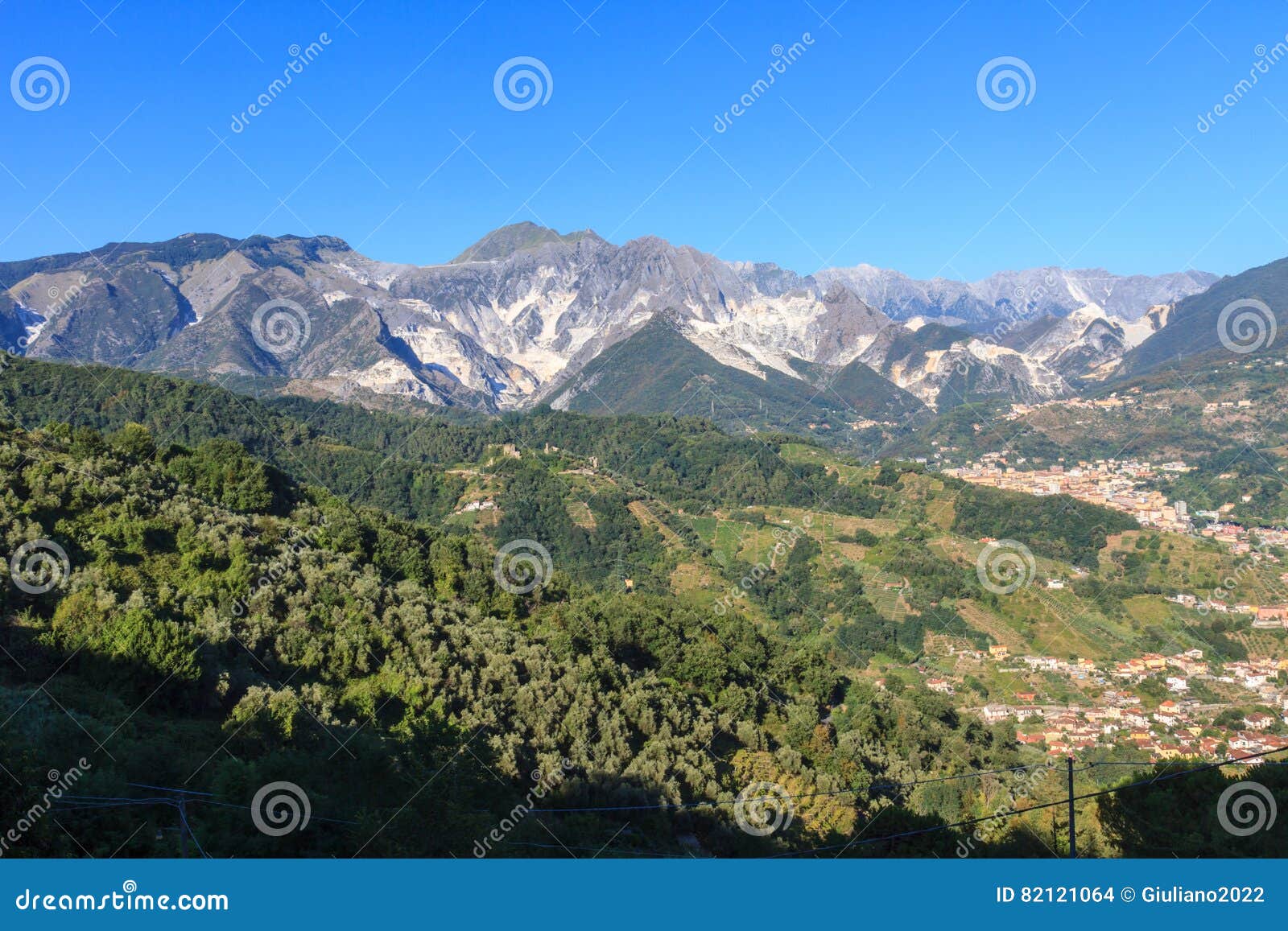 panoramic view of alpi apuane mountain chain in tuscany, italy