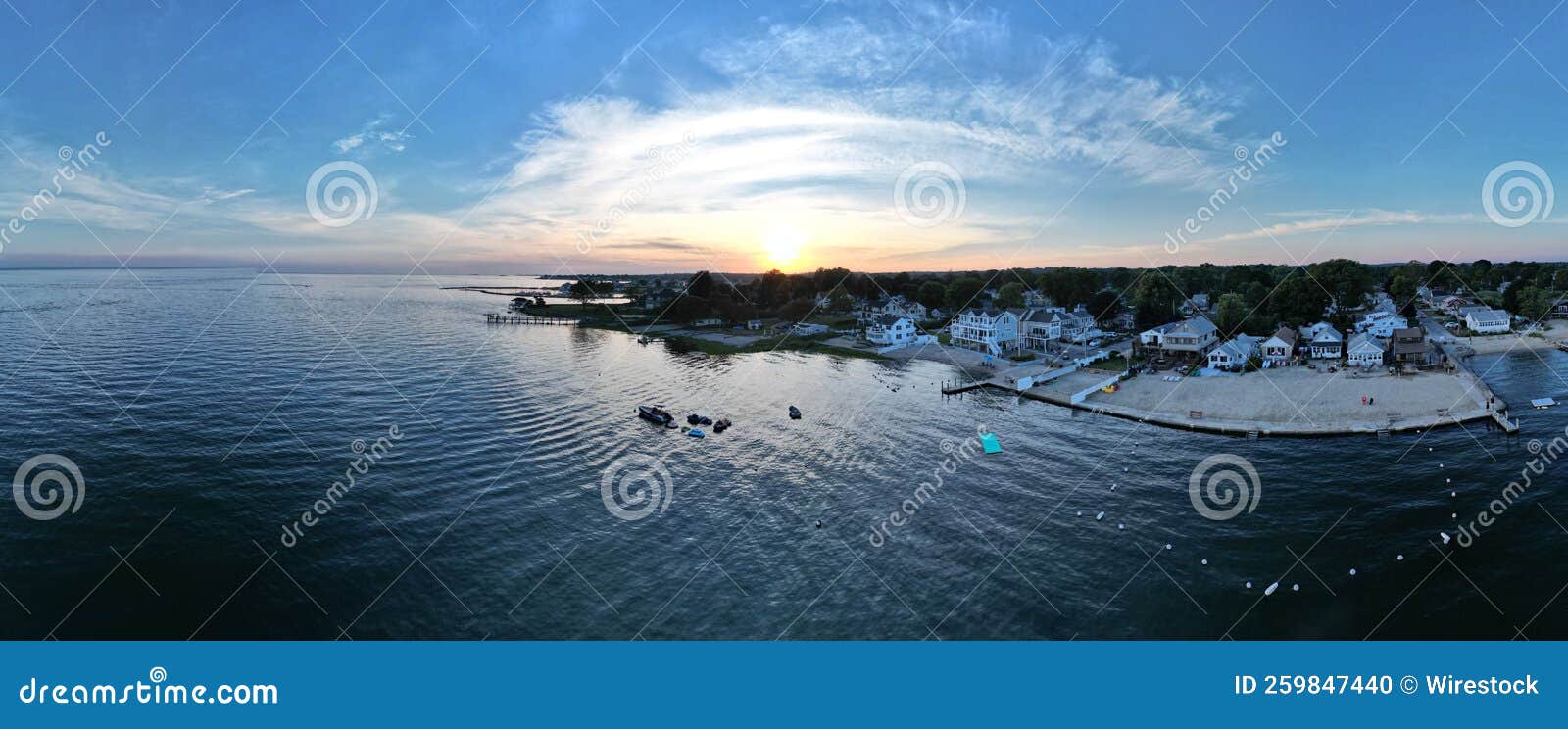 Panoramic View of a Beach and Inlet in Old Saybrook on the Sunset Stock