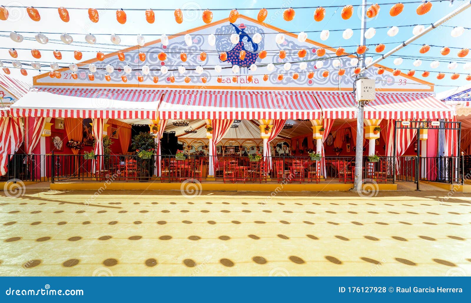 panoramic view of beautiful decorated caseta `fair tent` at the april fair feria de abril, seville fair feria de sevilla, and
