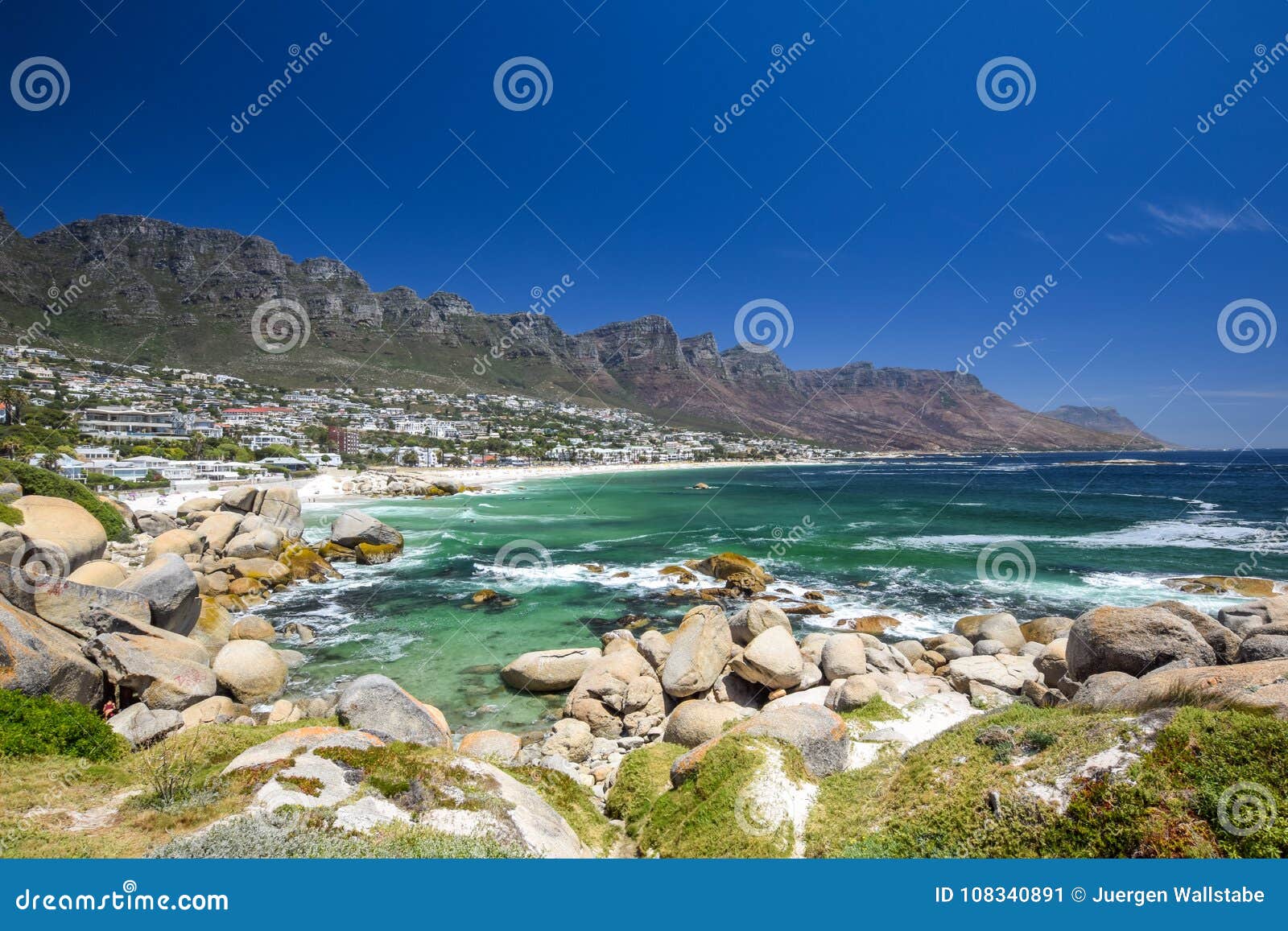 panoramic view of camps bay, an affluent suburb of cape town, western cape, south africa