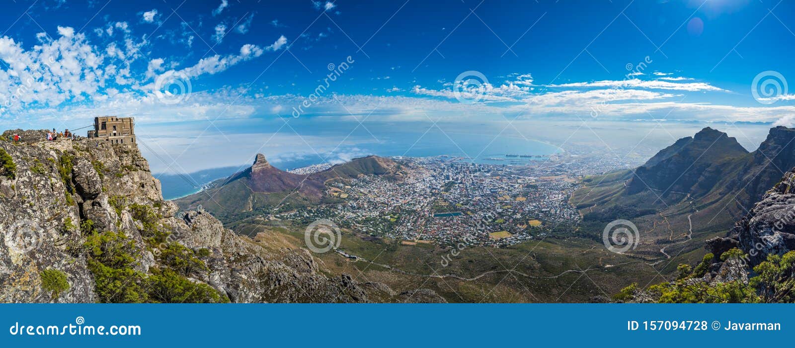 panoramic view of cape town, lion`s head and signal hill from the top of table mountain
