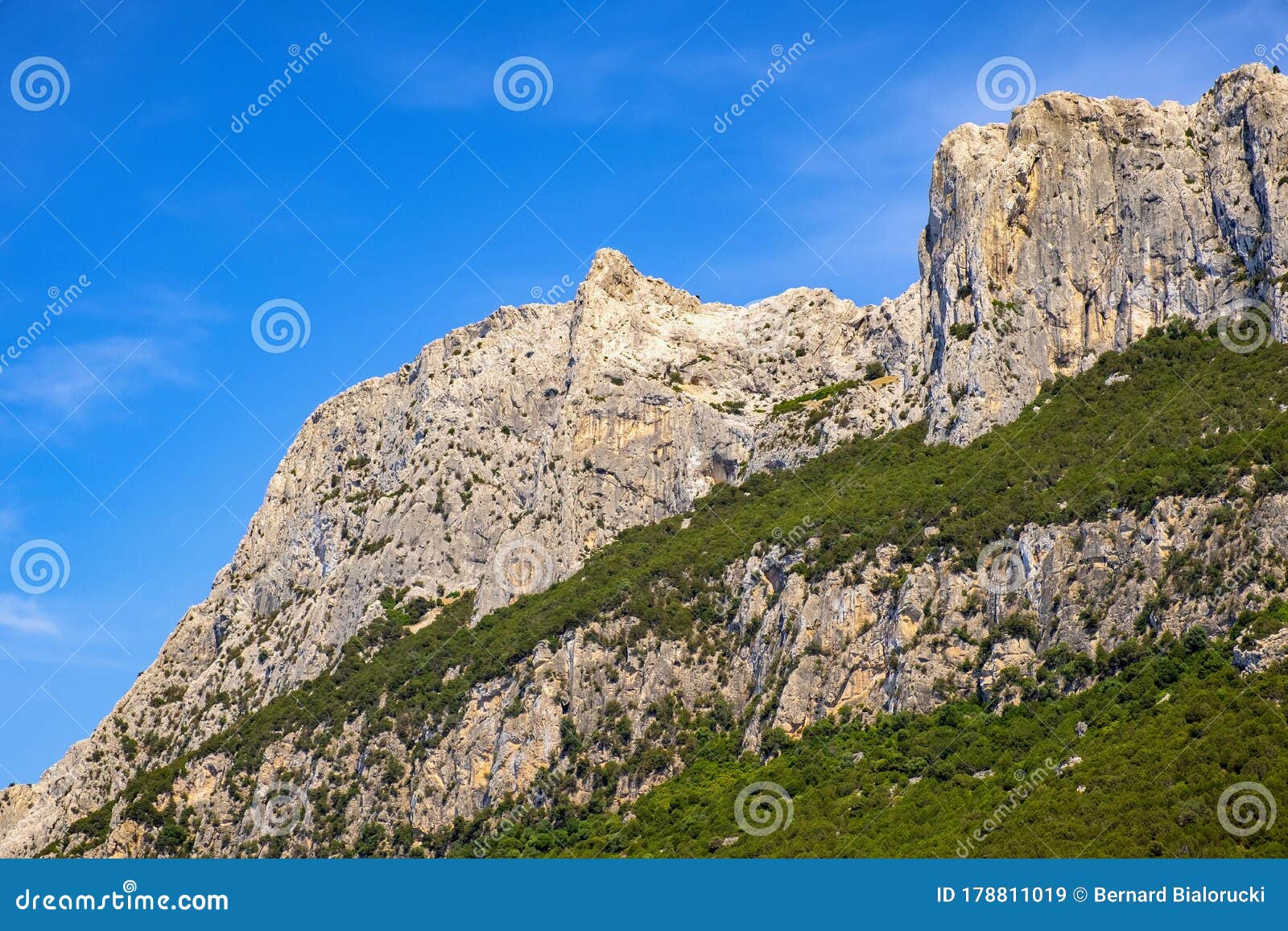 cliffs and slopes of main limestone massif, monte cannone peak, of isola tavolara island on tyrrhenian sea off