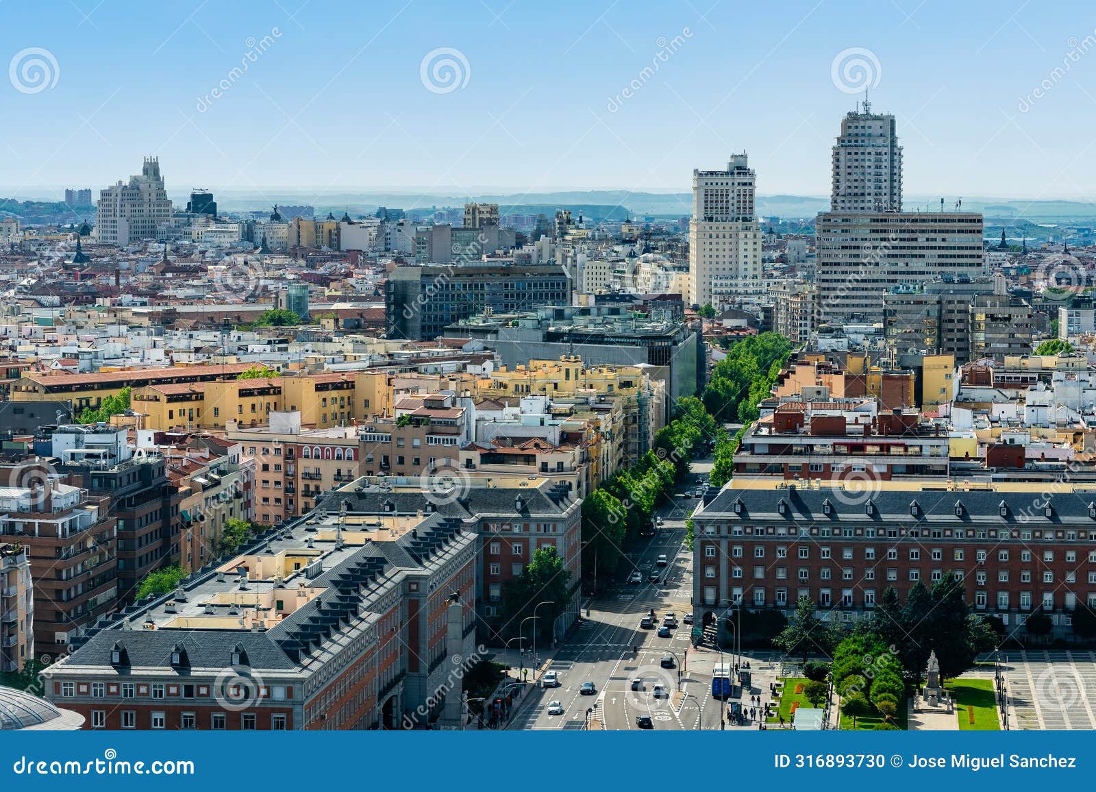 panoramic view from a drone view of the city of madrid in the area of moncloa and plaza spain.