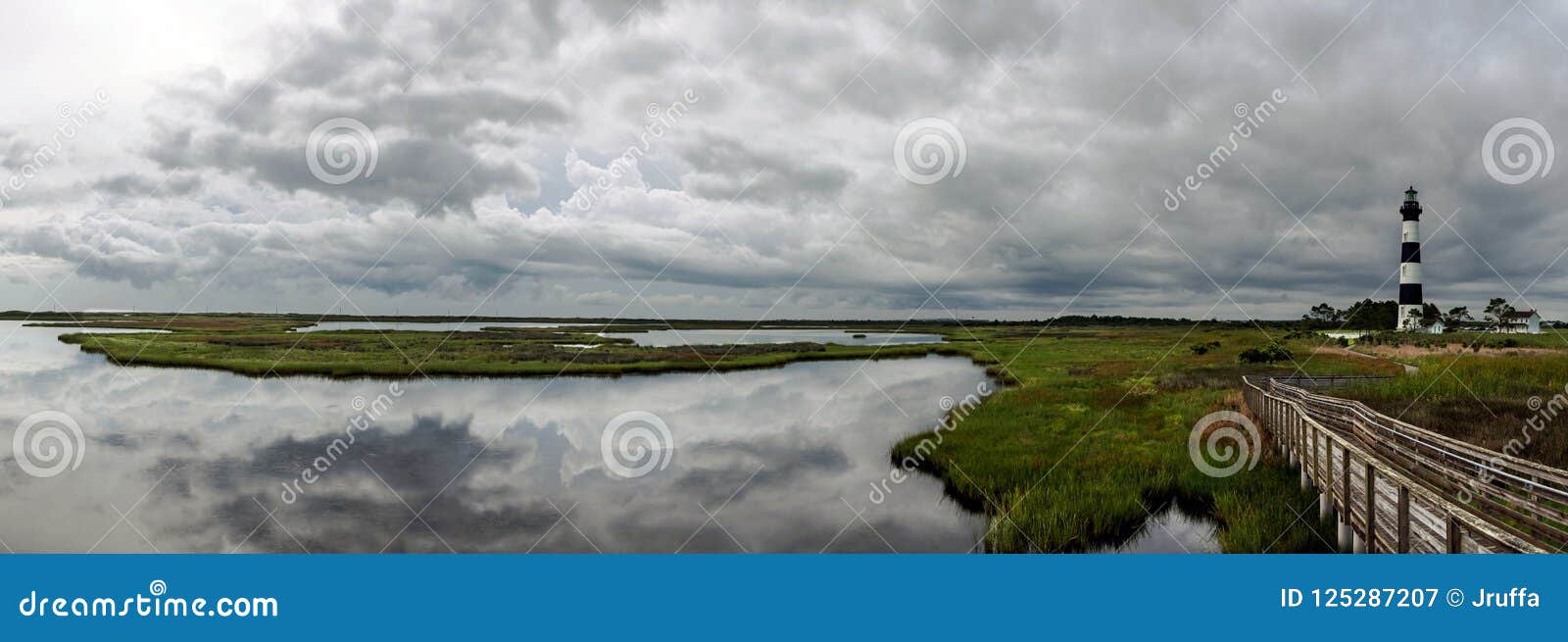 panoramic view of lighthouse and surrounding marshlands