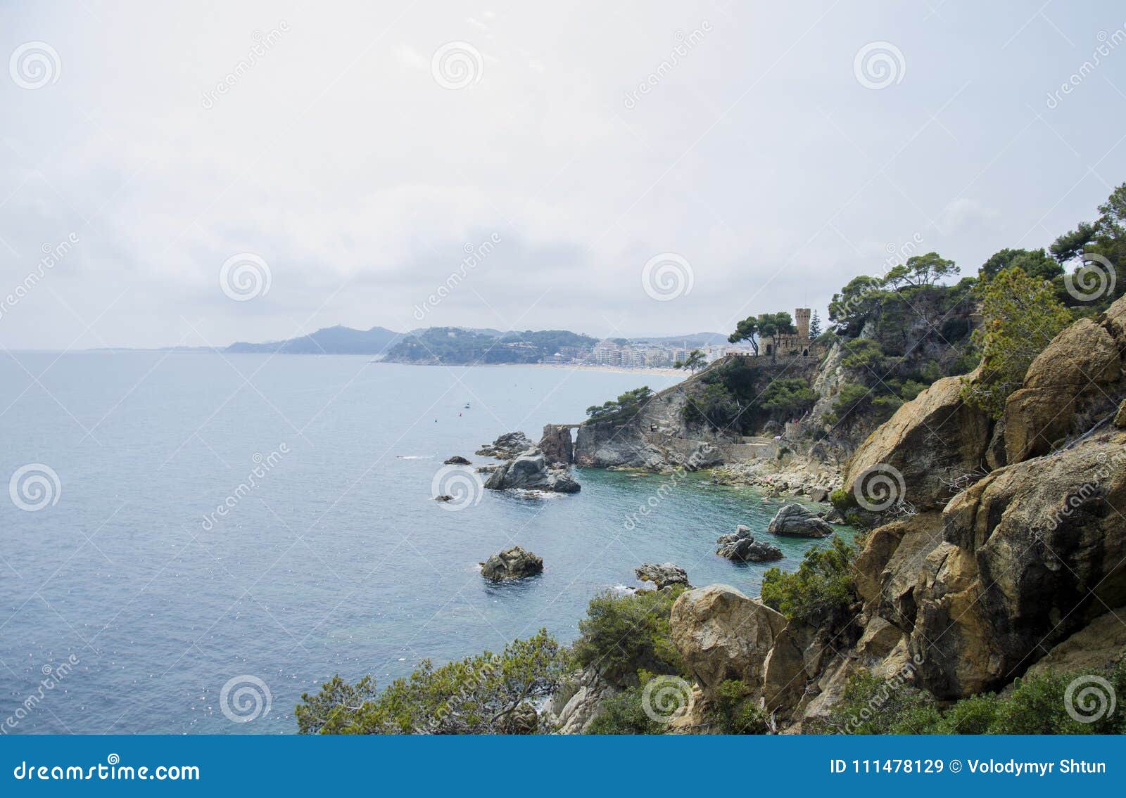 panoramic view of lloret de mar castle at sunset, costa brava between barcelona and girona, spain. ancient fortress in