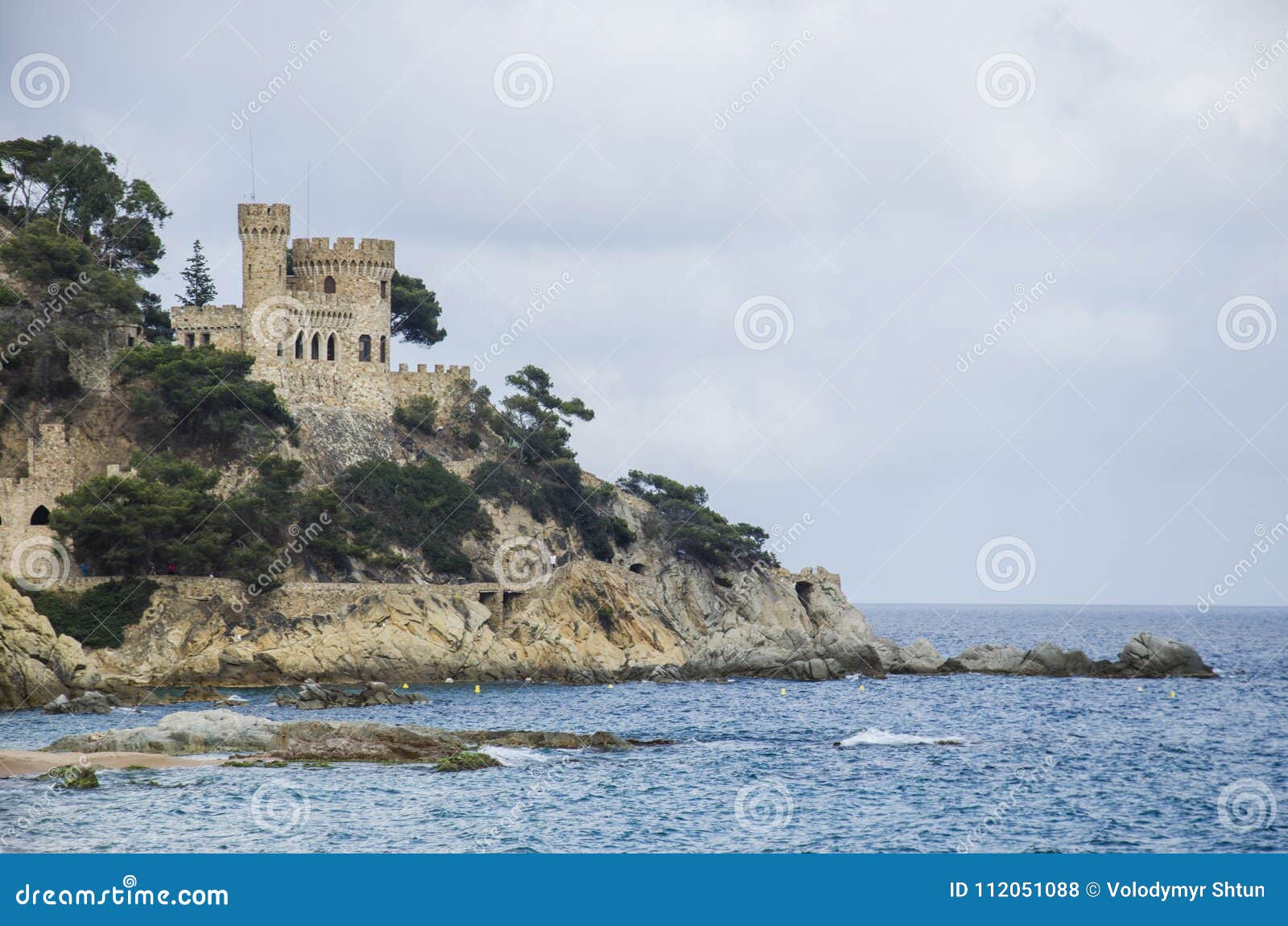 panoramic view of lloret de mar castle at sunset, costa brava between barcelona and girona, spain. ancient fortress in