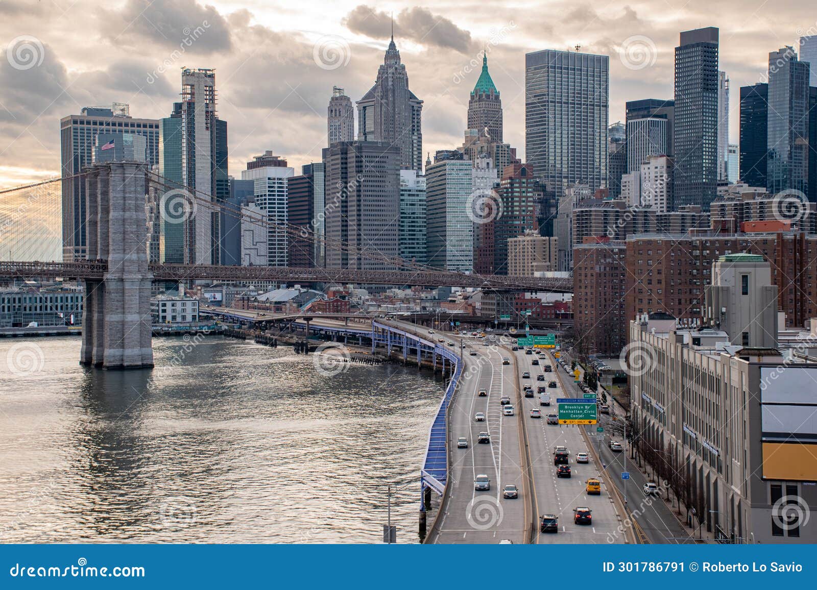 panoramic view of lower manhattan with fdr drive in the foreground