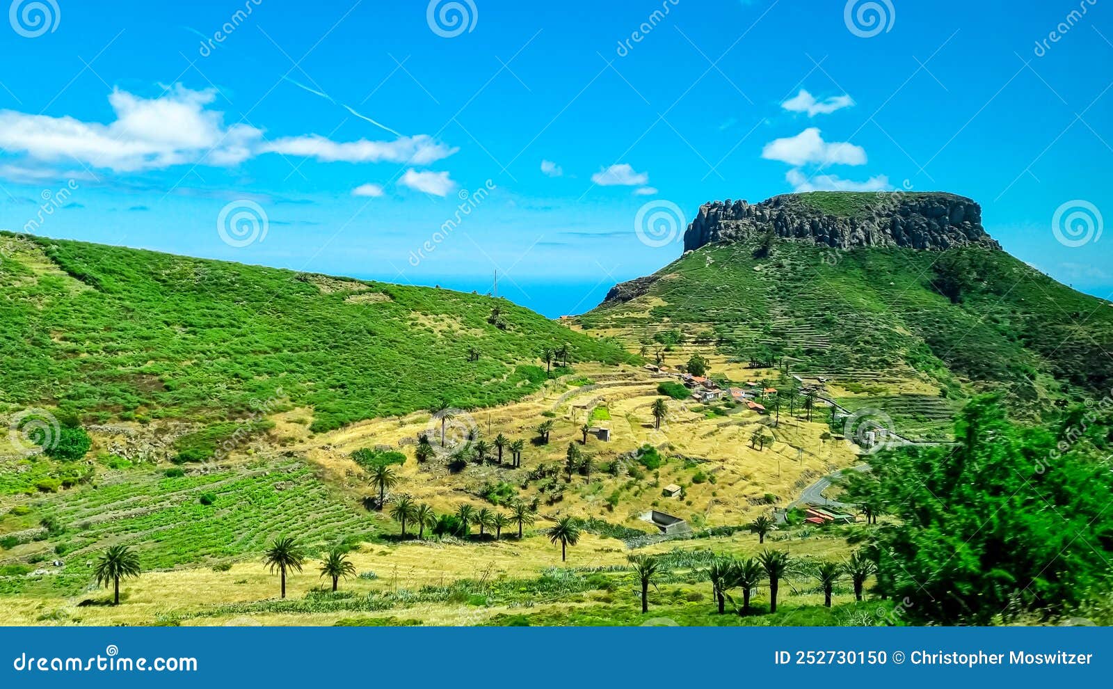 panoramic view on massive volanic plug fortaleza de chipude overlooking western coast of la gomera, canary islands, spain,