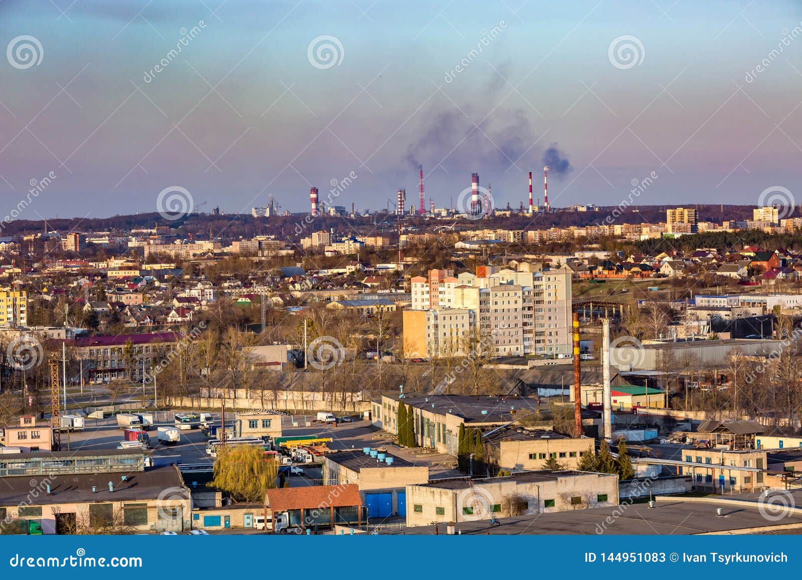 panoramic view on new quarter high-rise building area urban development residential quarter in the evening from a bird`s eye view