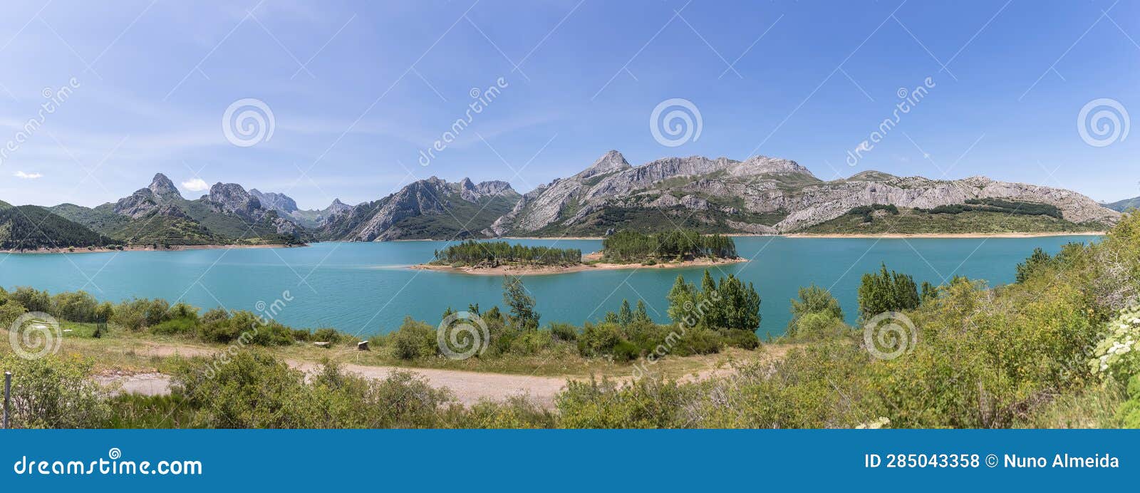 panoramic view at the riaÃ±o reservoir, located on picos de europa or peaks of europe