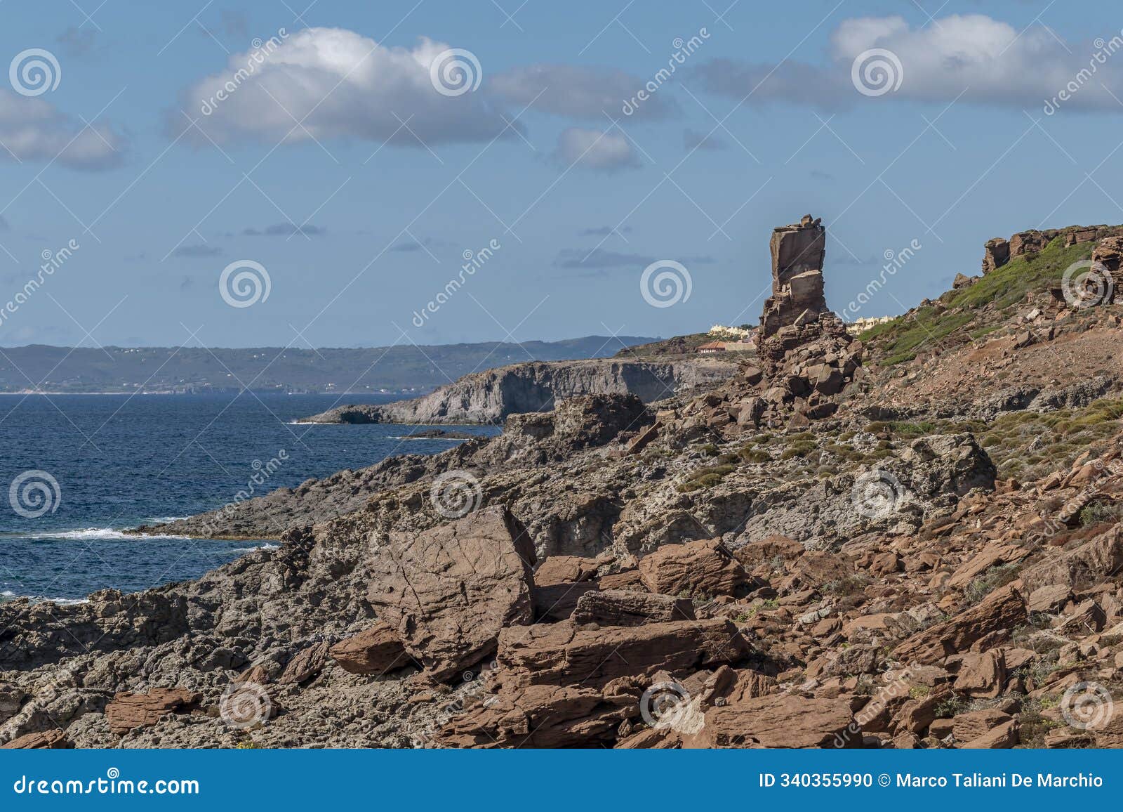 panoramic view of rocks and sea at is praneddas, sant'antioco island, italy