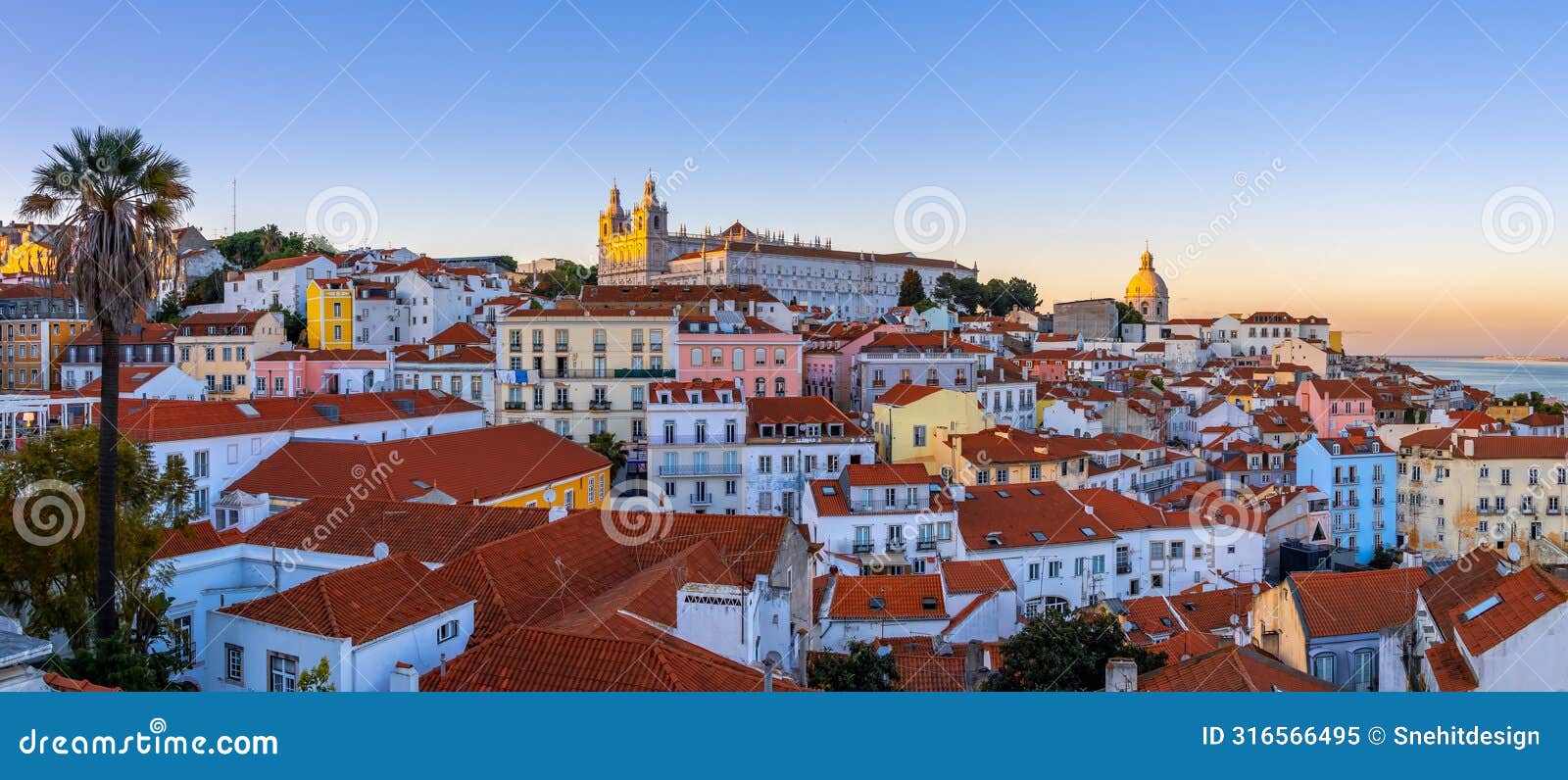 panoramic view of skyline of lisbon city, portugal, many colorful houses in the alfama district