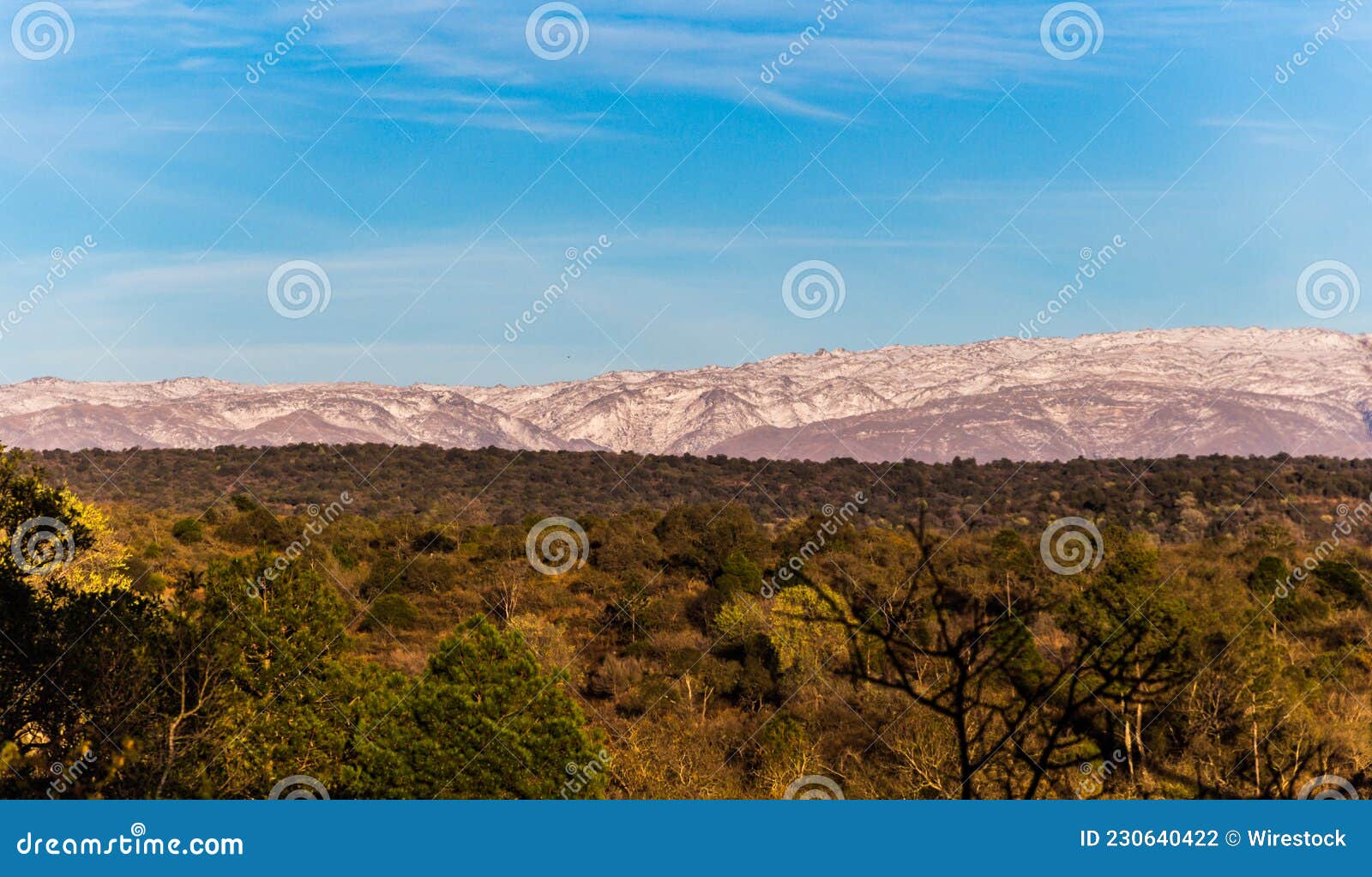 panoramic view of the snowy mountain ranges in the calamuchita valley, cordoba, argentina