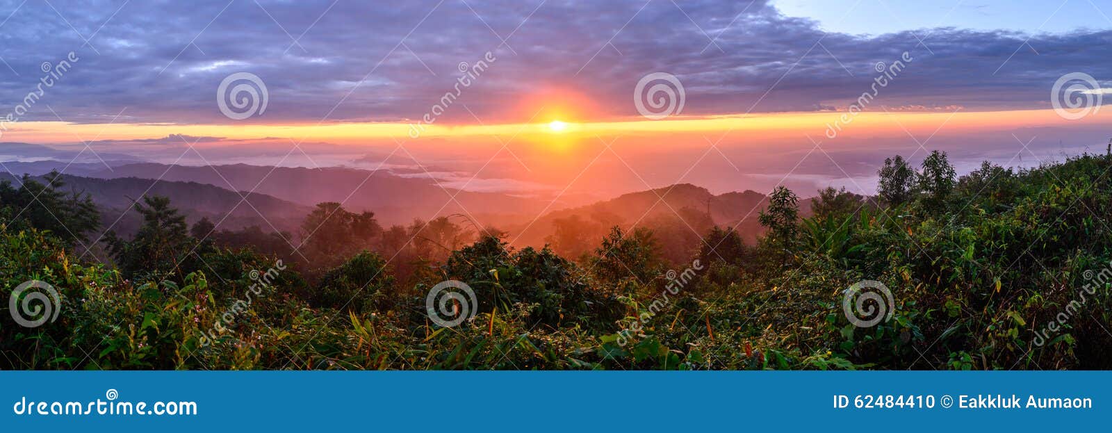 panoramic view of sunrise with mist and mountain at doi pha hom pok, the second highest mountain in thailand, chiang mai, thailand