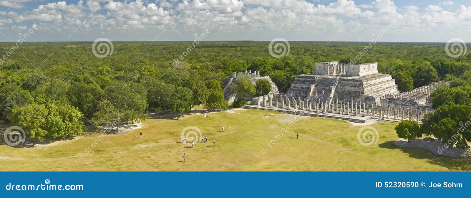 a panoramic view of the temple of the warriors out of jungle at chichen-itza. a mayan ruin, in the yucatan peninsula, mexico