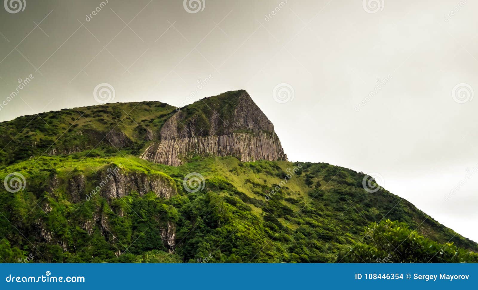 panoramic view to rocha dos bordoes aka catchphrases cliff at flores, azores, portugal