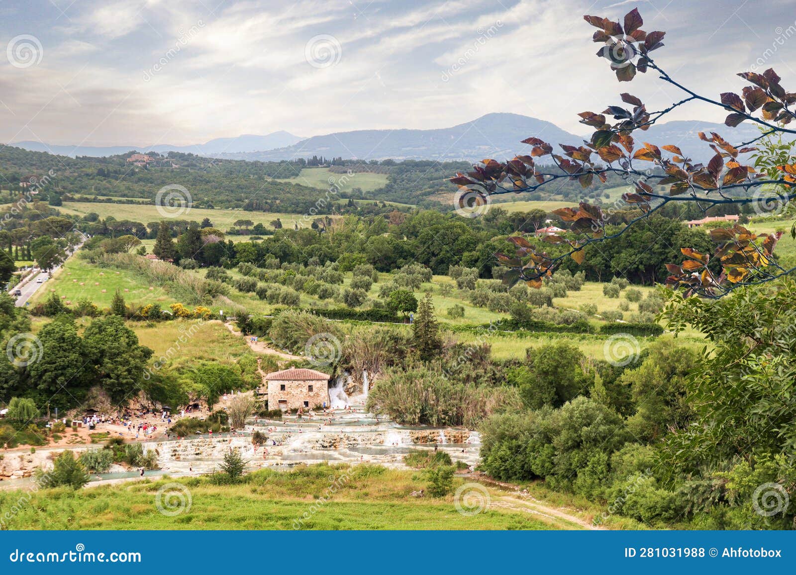 panoramic view to saturnia spa town with hot spring and waterfall at cascate del mulino (mill waterfalls)