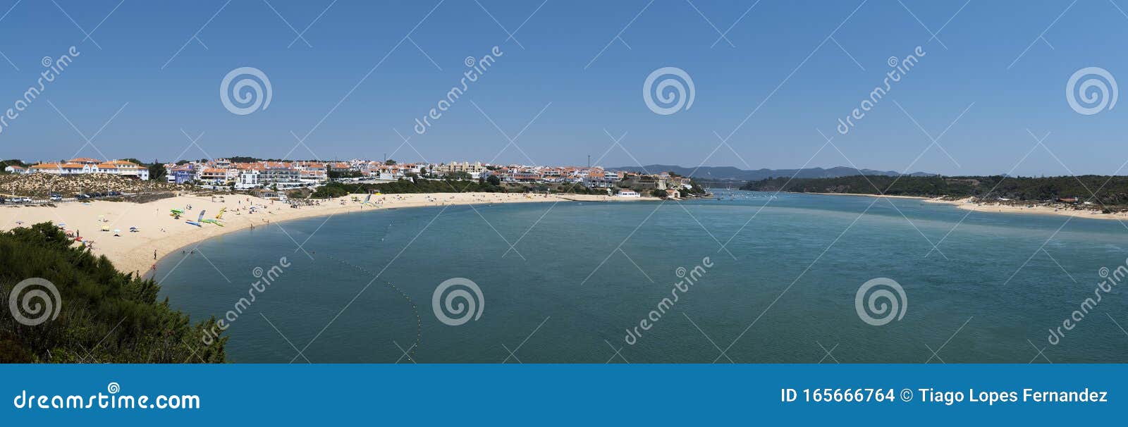 panoramic view of the village of vila nova de mil fontes with the beach and the mira river mouth in alentejo