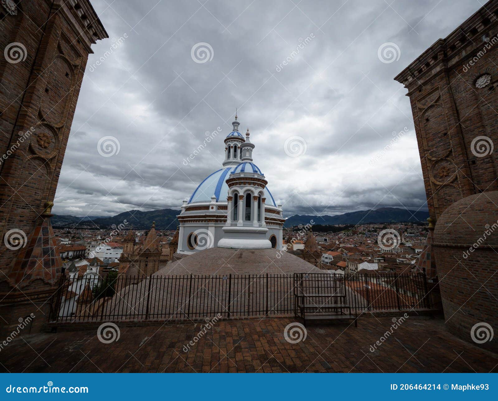 panoramic view of white blue dome from rooftop of catholic new cathedral of cuenca in city center downtown azuay ecuador