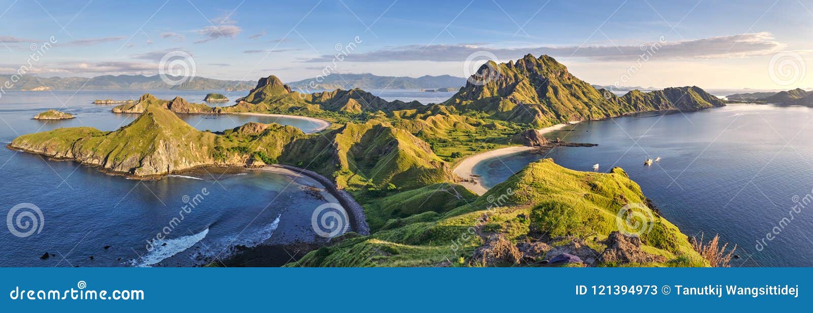 panoramic warm view at top of `padar island` in sunrise late morning from komodo island, komodo national park, labuan bajo, flor