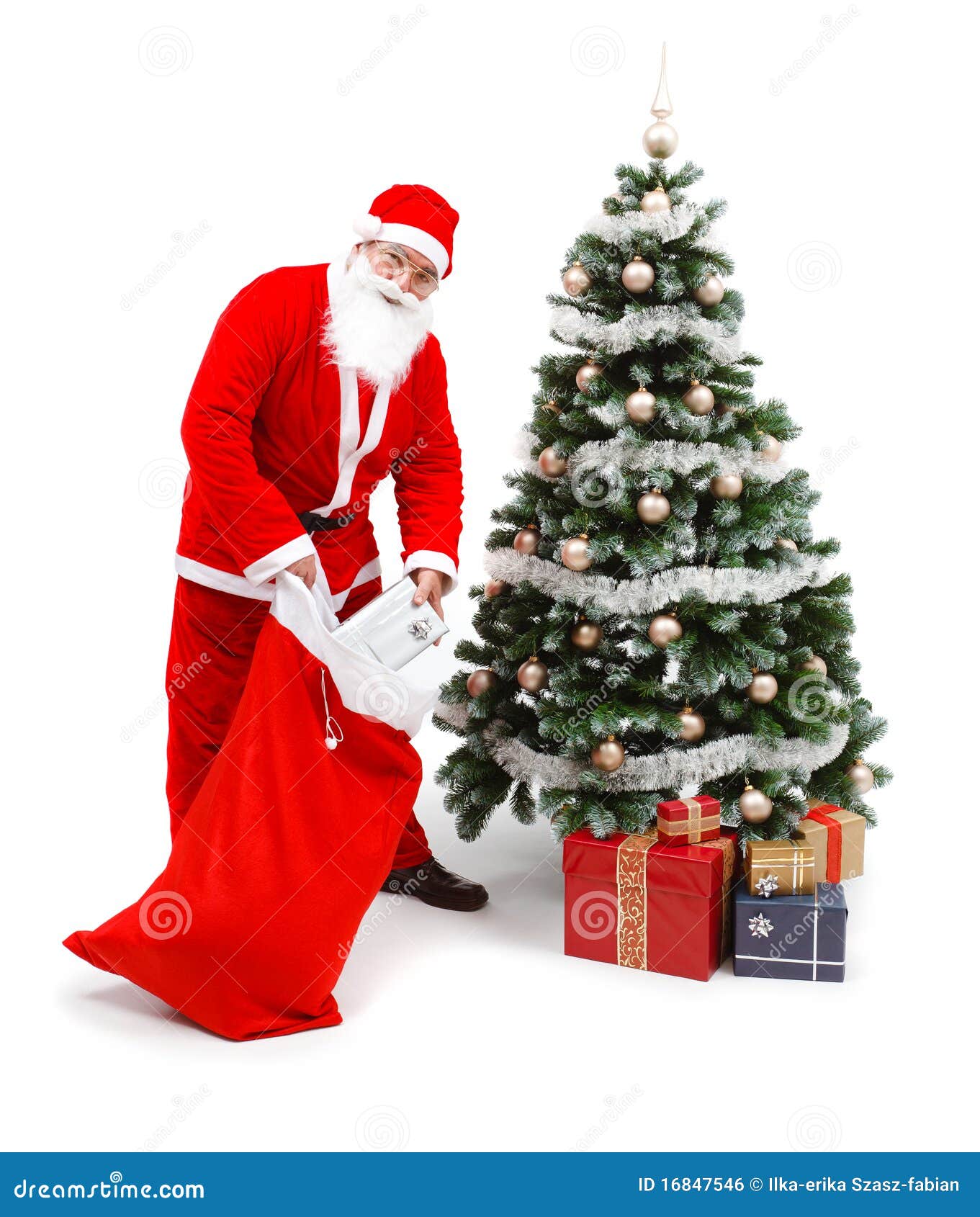 Papai Noel Que Põr Presentes Sob a árvore De Natal Foto de Stock - Imagem de  decorativo, envolvido: 16847546