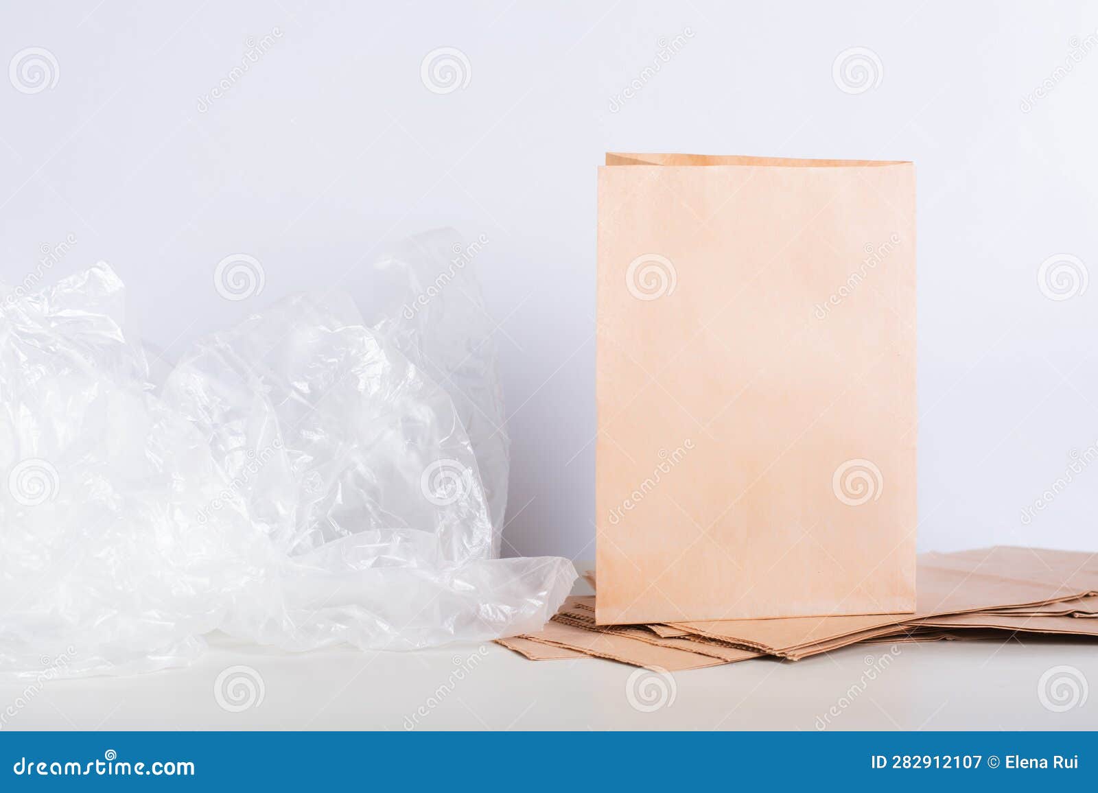 Paper Bag on a Stack of Bags and Crumpled Cellophane Plastic Bags on