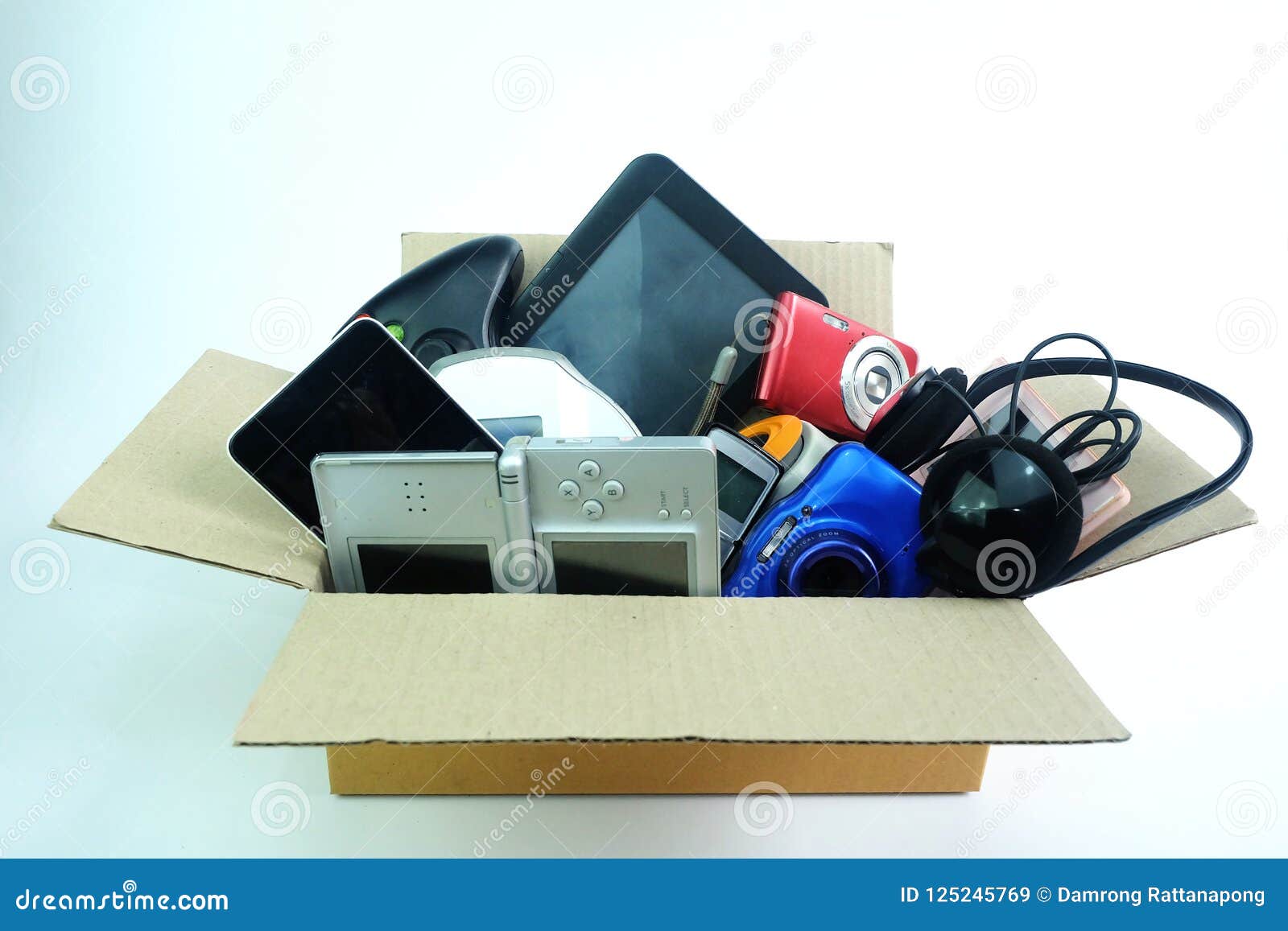 Damaged or old used electronics gadgets for daily use on white background,  Reuse and Recycle concept, Top view. Stock Photo