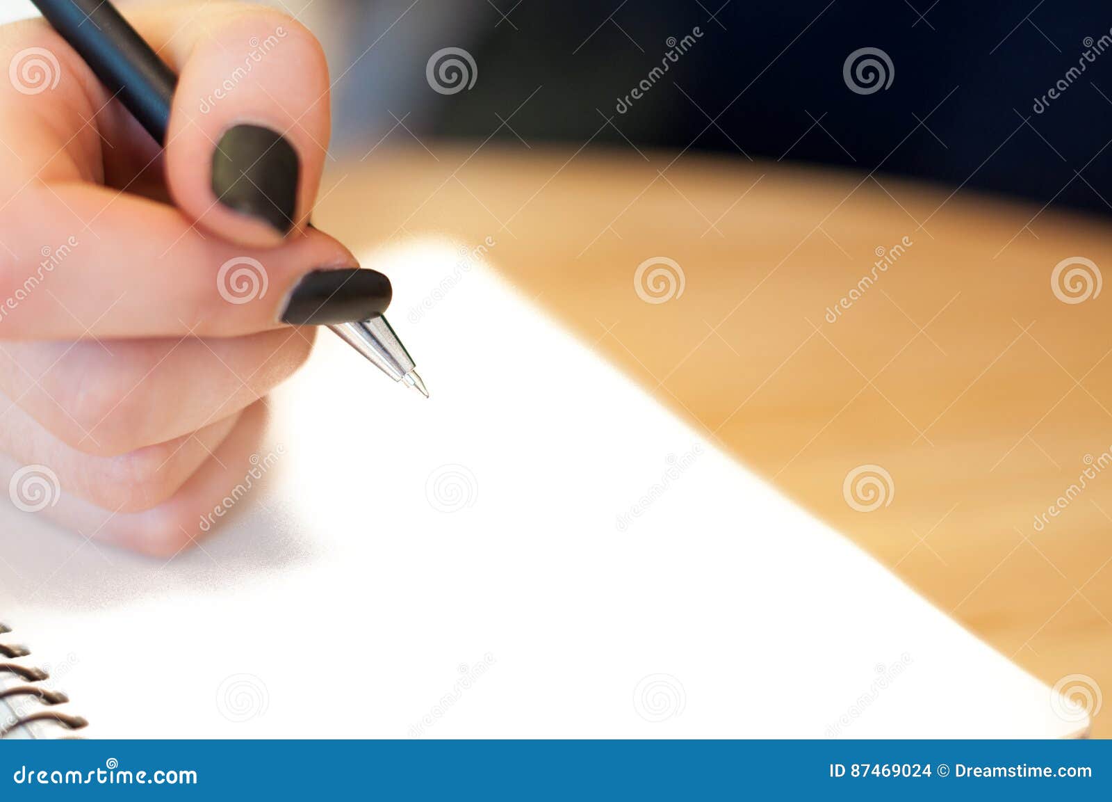 Paper in Business Woman Female Hand Writing Notes on a Table Black ...