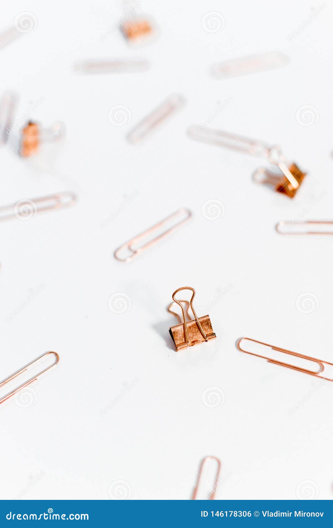 Paper Clips Copper Color on White Background. Stock Illustration