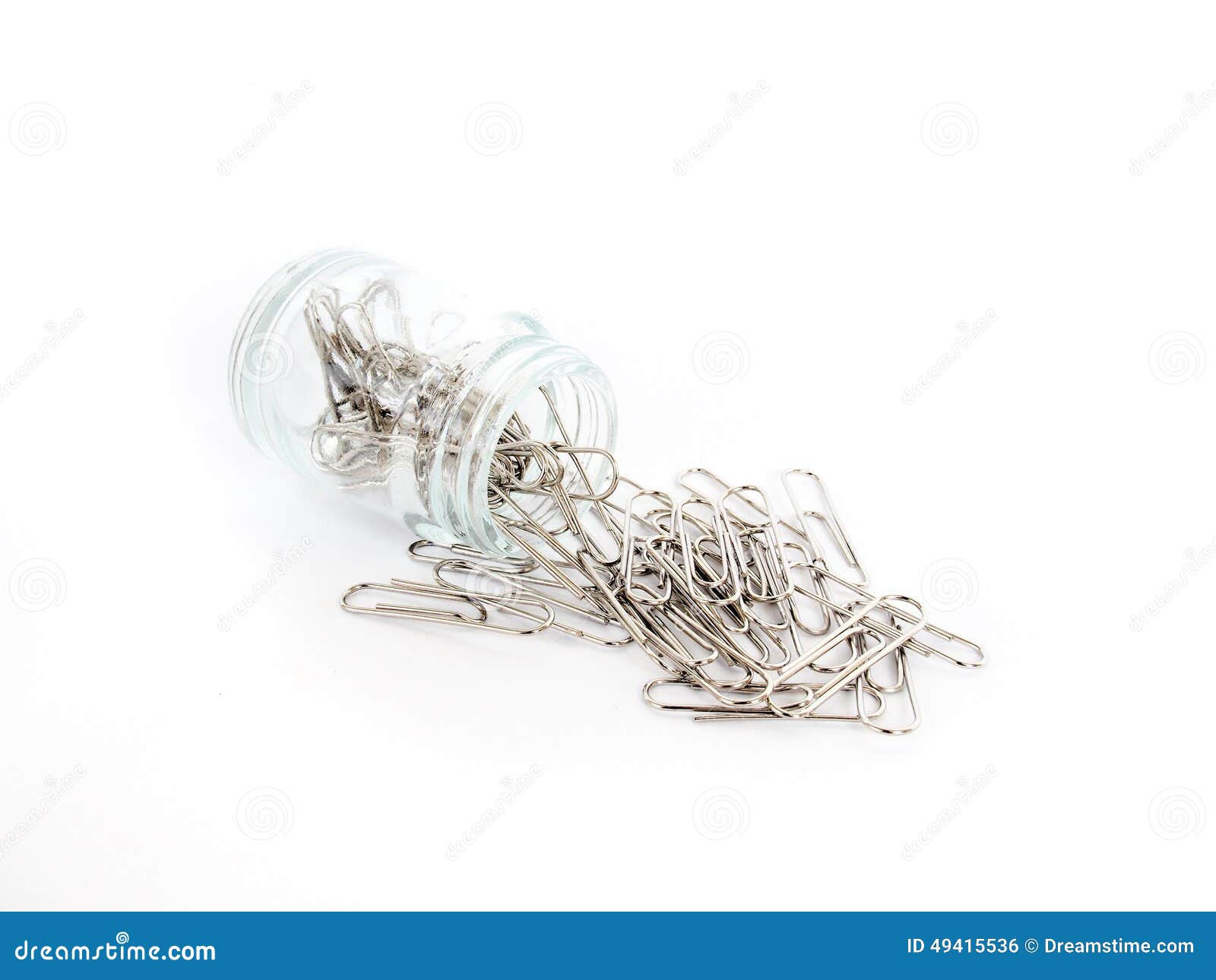 Paper clips and glass jar stock photo. Image of work 49415536