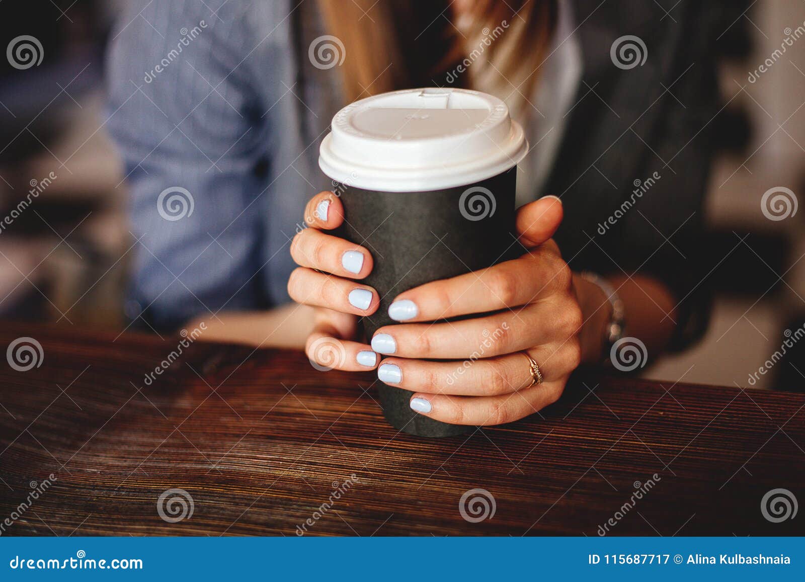 Cup of coffee in hand. stock image. Image of breakfast 115687717