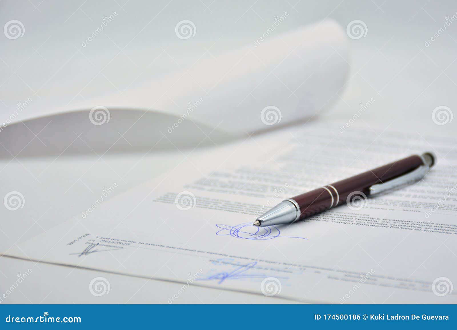 document signed with a pen, contract