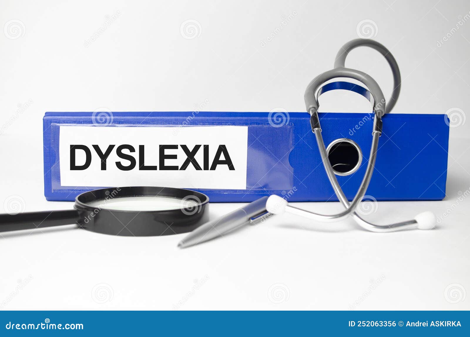 Paper with Dyslexia on Blue File Folder and White Background Stock