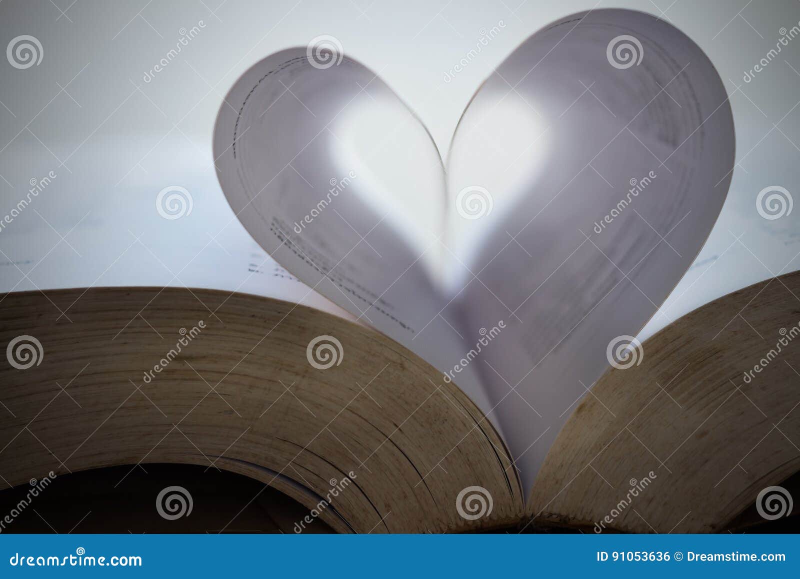 Paper Hearts on Old Book for Valentine`s Day. Stock Photo Image of