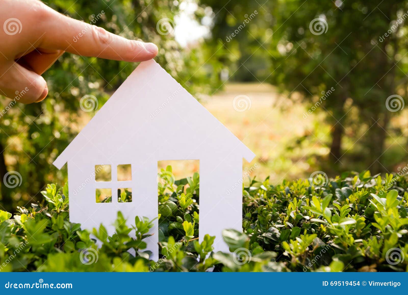 Paper House Against Green Background. Real Estate Concept Stock Photo ...